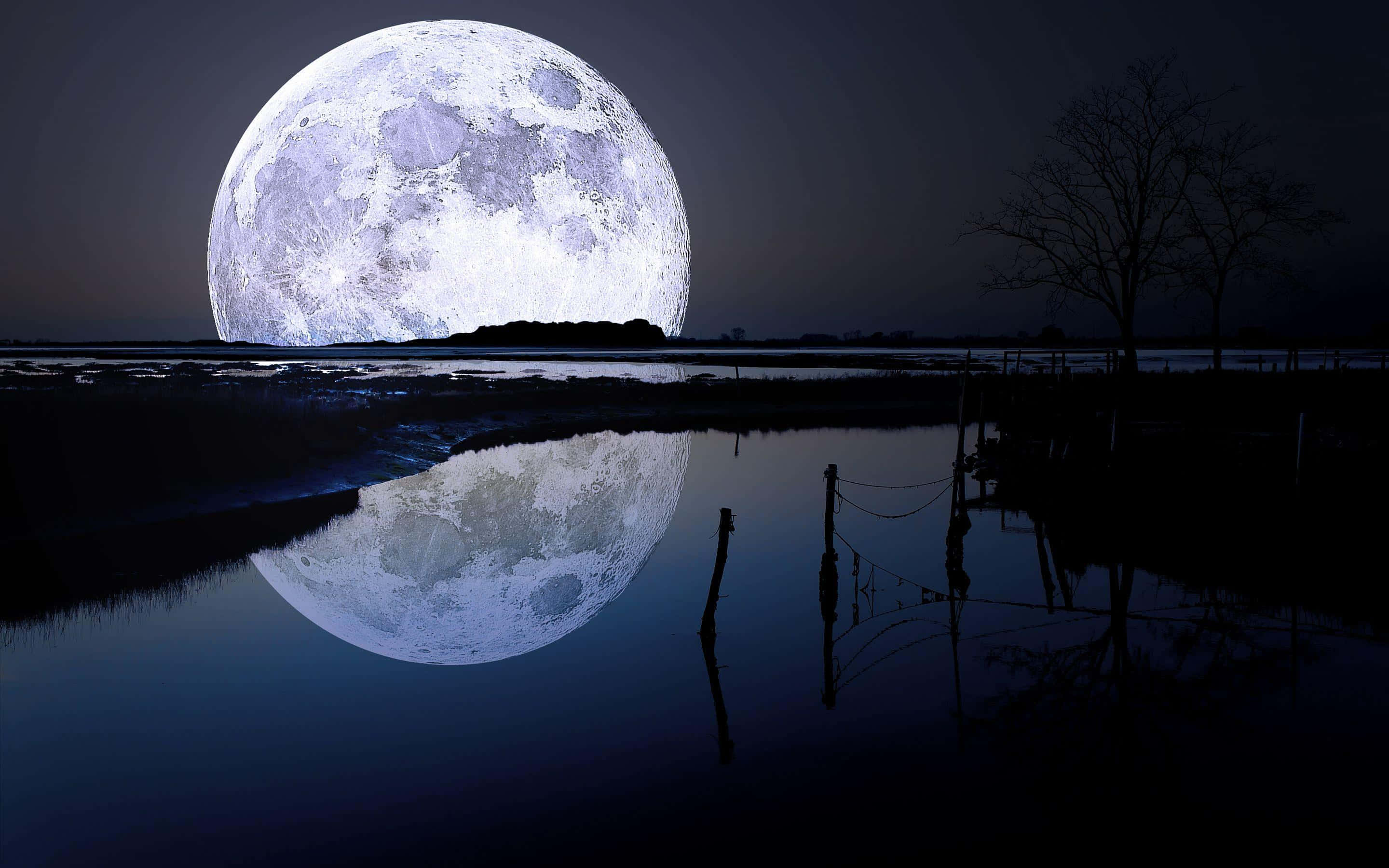 Cool Moon, massive luminous moon, calm waterway, 2K Desktop Wallpaper