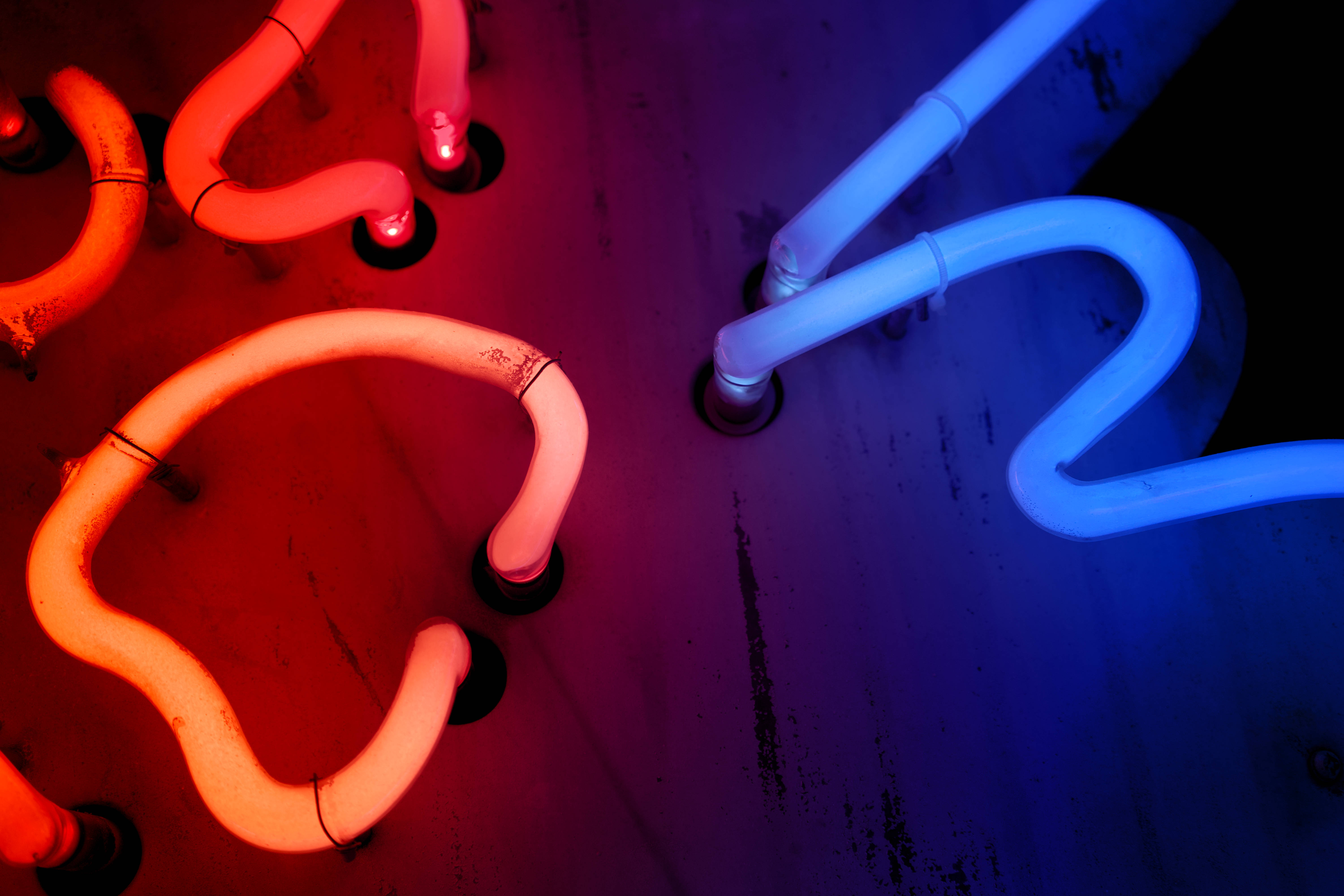 red and blue neon tubes, dark textured wall, vibrant red, 5K Desktop Wallpaper