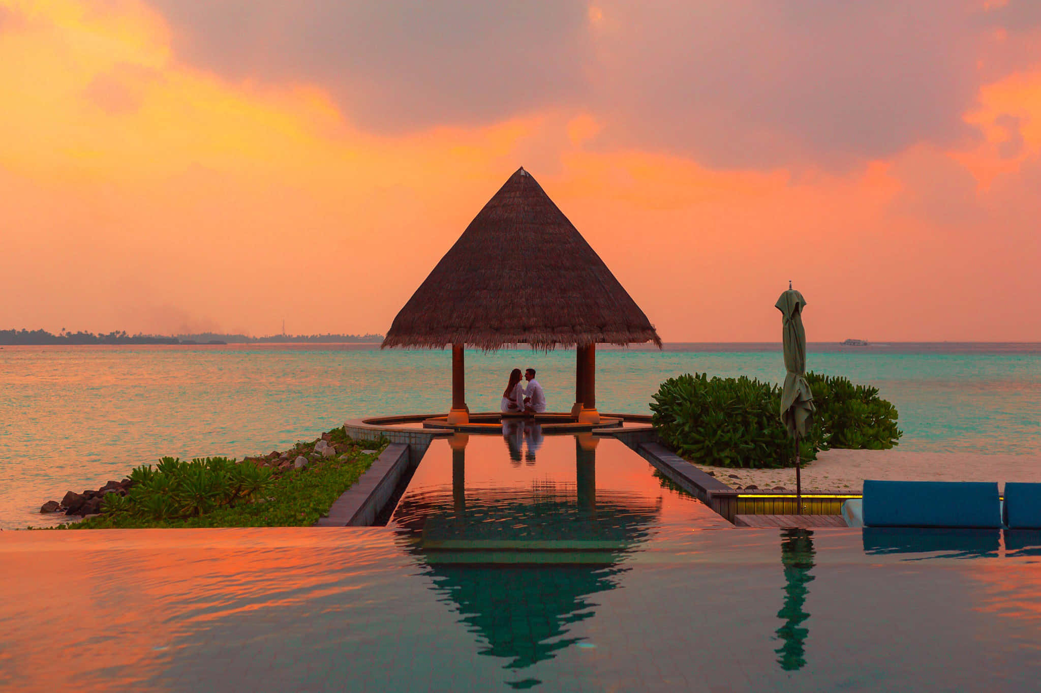thatched roof pavilion, infinity pool, fiery orange and pink skies, Full HD Desktop Wallpaper