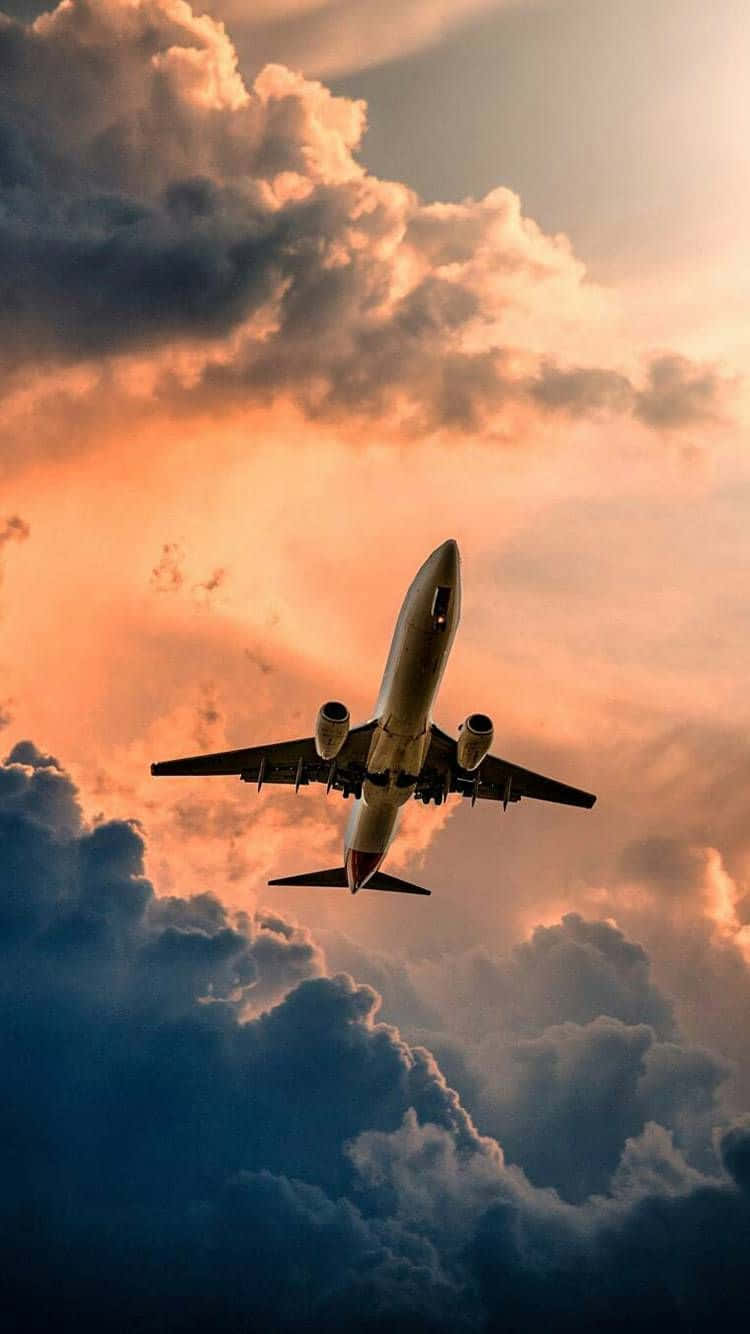 sleek and cool plane, commercial airplane, dramatic clouds, HD Phone Wallpaper