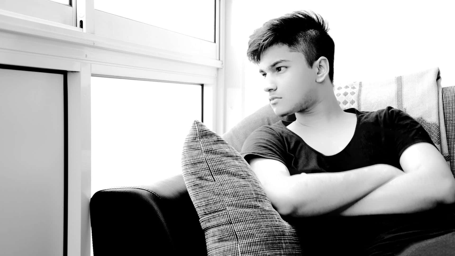 Cool Sad Boy, couch, window, Full HD Desktop Wallpaper