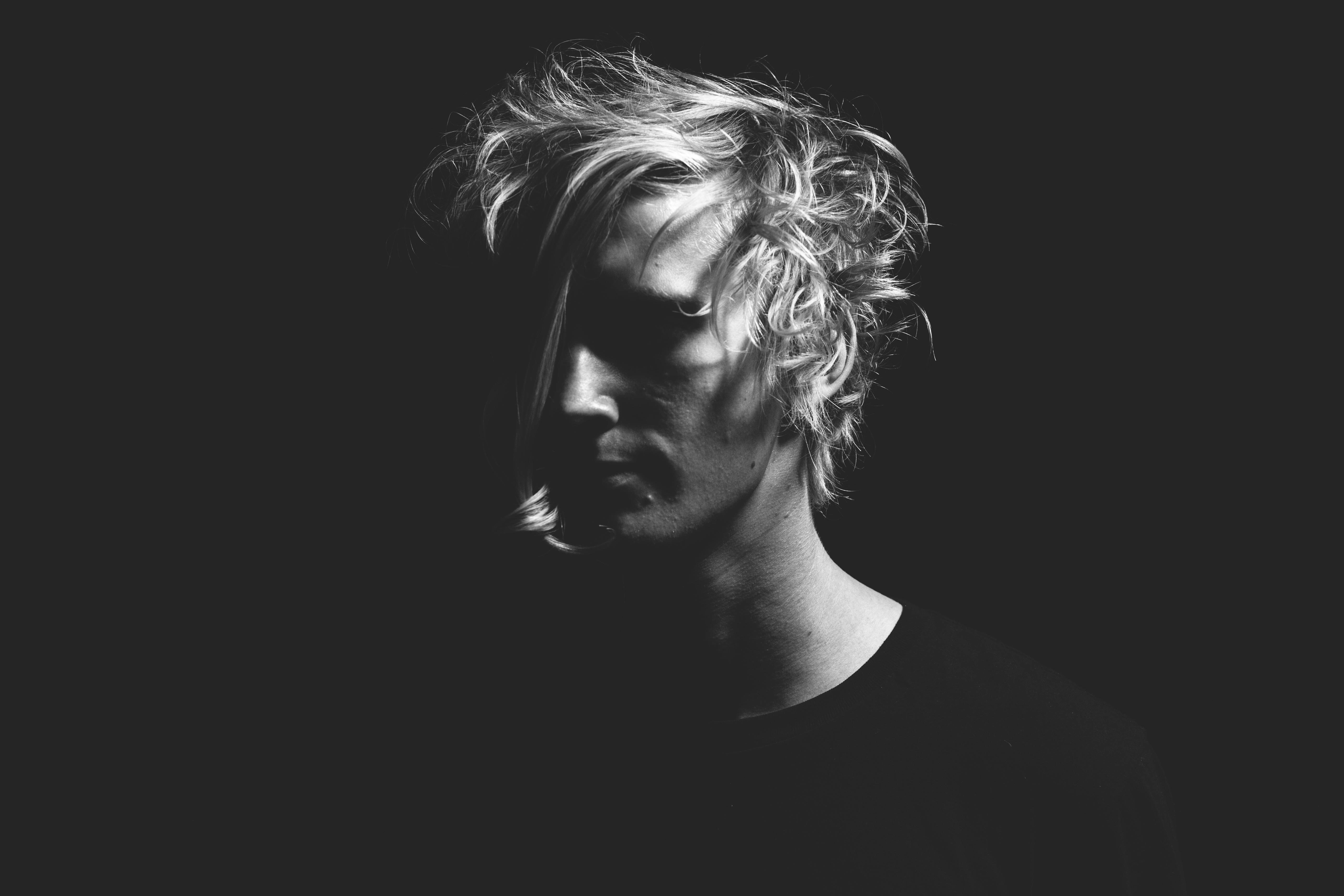 black and white, tousled hair, half his face in shadow, 5K Desktop Wallpaper