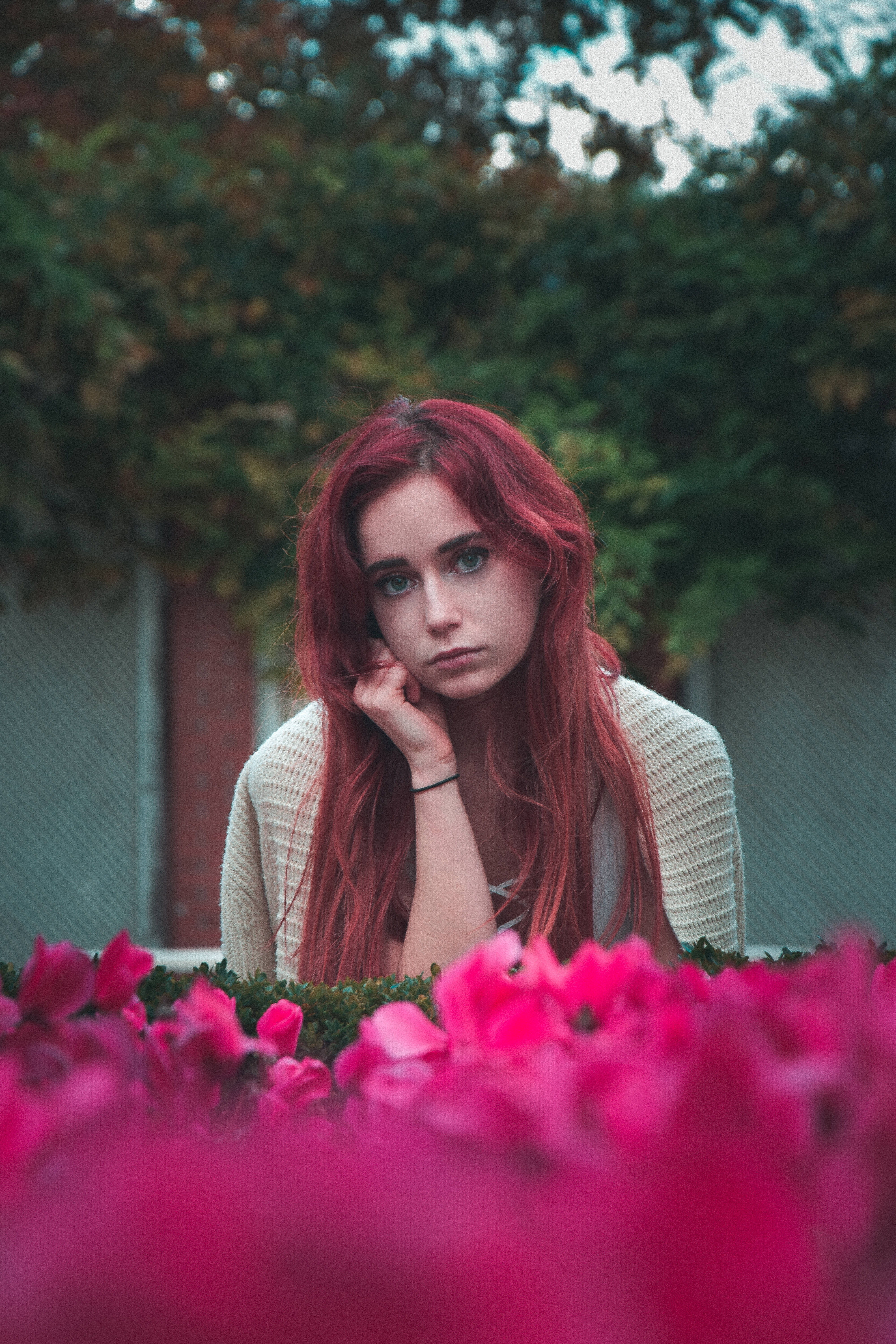 cool sad girl, vibrant red hair, vivid pink flowers, 5K Phone Wallpaper