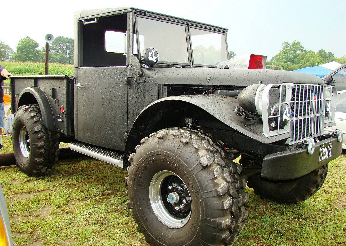 matte black, vintage military-style truck, massive knobby tires, SD Desktop Wallpaper