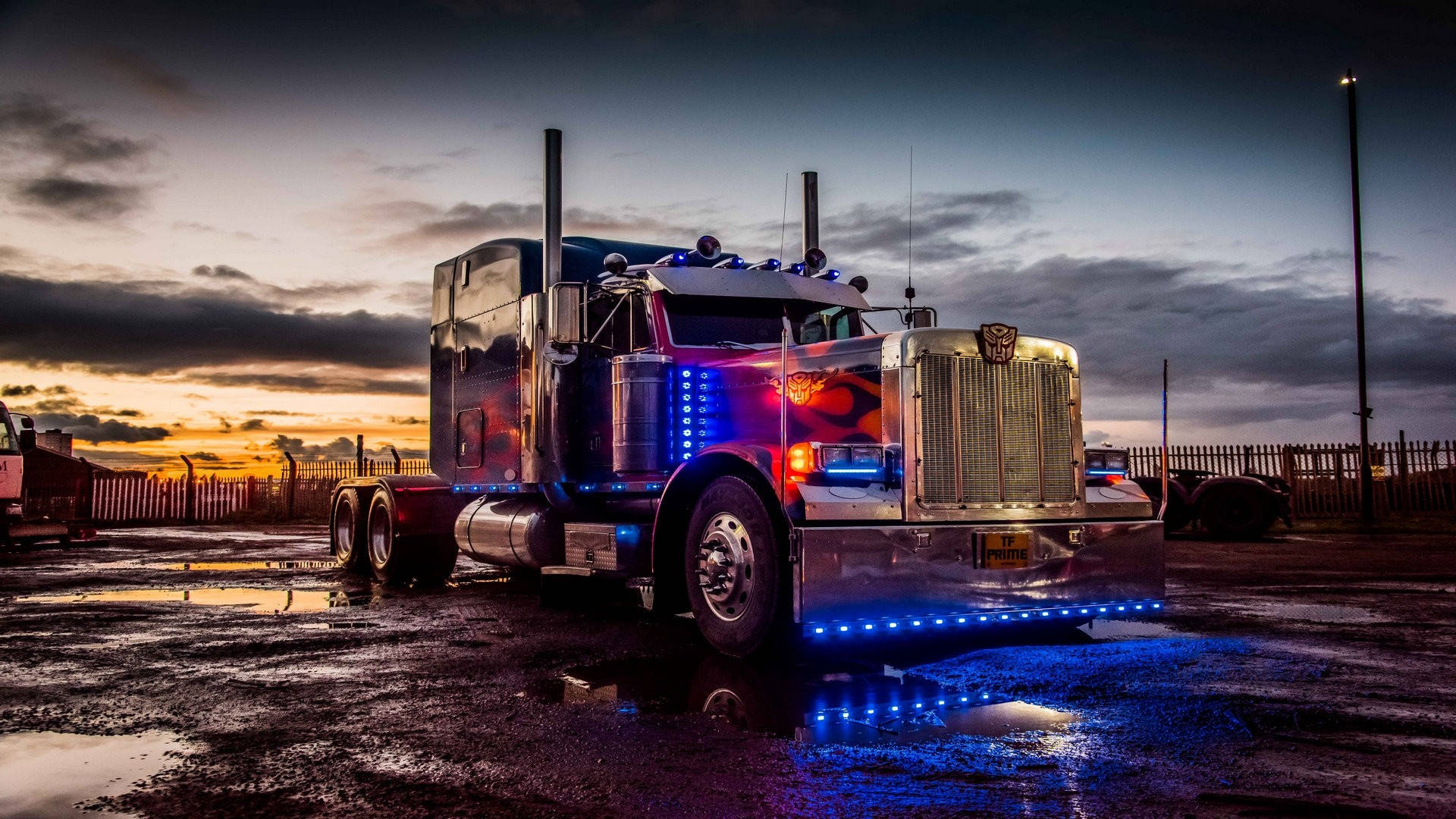chrome semi-truck, blue LED lights, wet pavement, Full HD Desktop Wallpaper