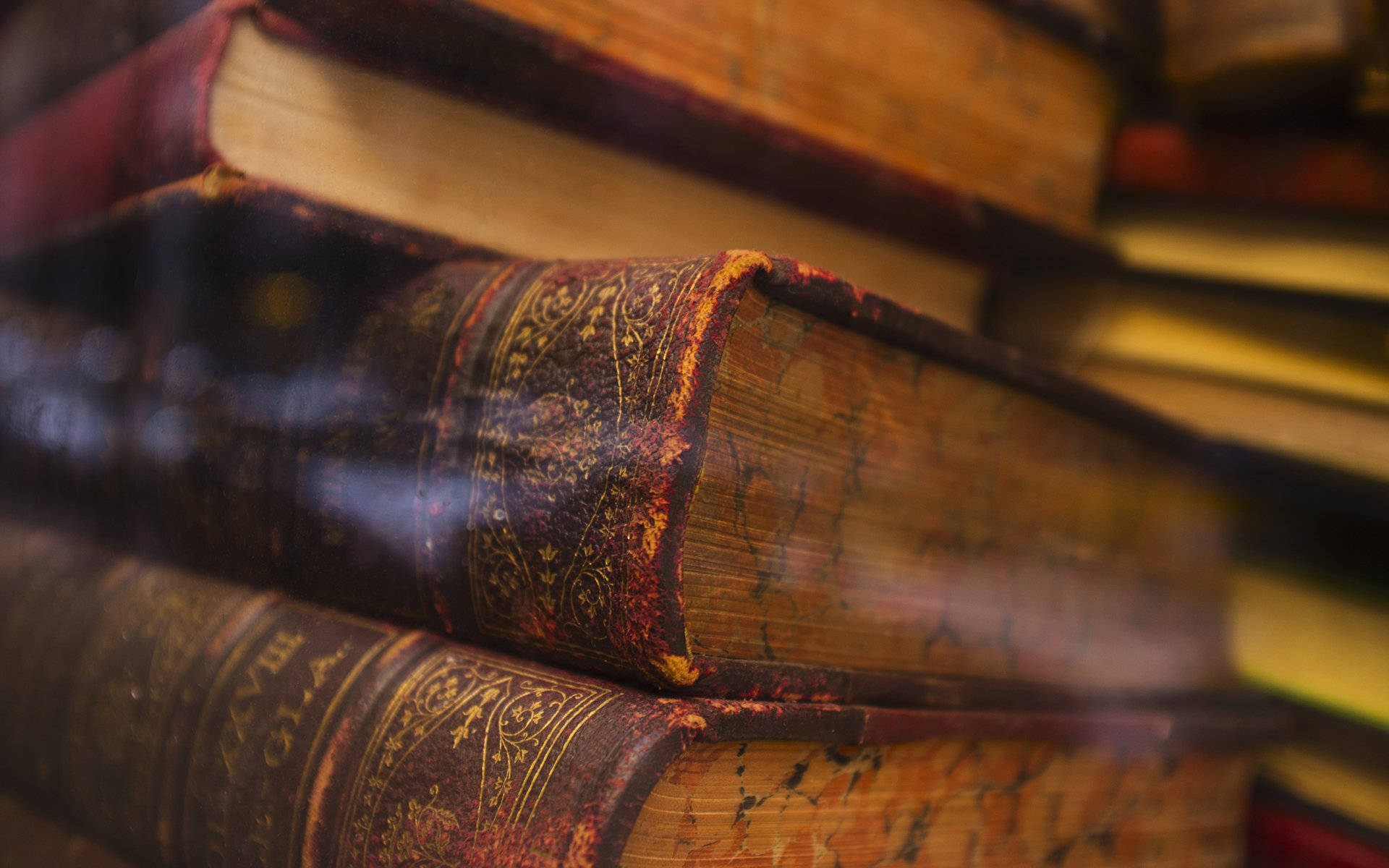 vintage leather-bound books, gold embossing, worn spines, Full HD Desktop Wallpaper