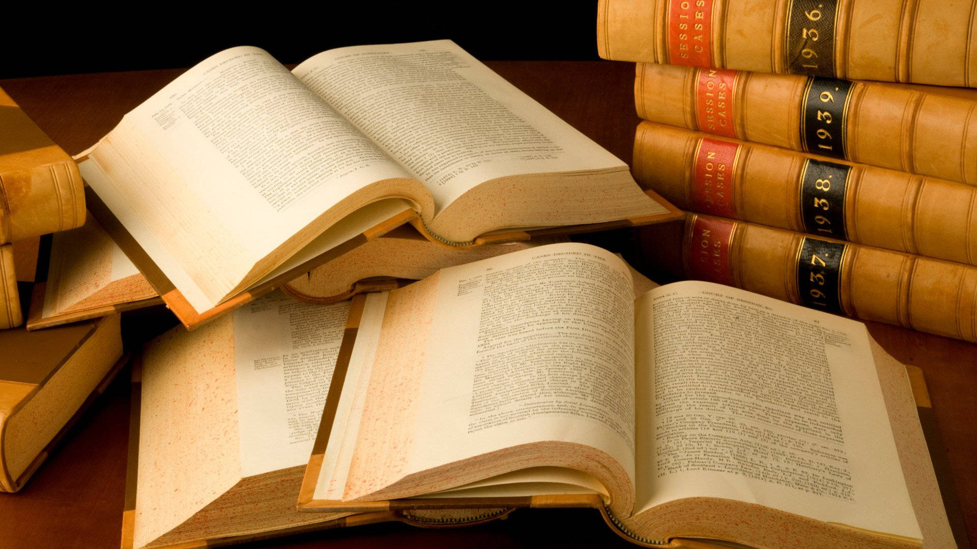 vintage leather-bound law books, open pages, soft lighting, Full HD Desktop Wallpaper