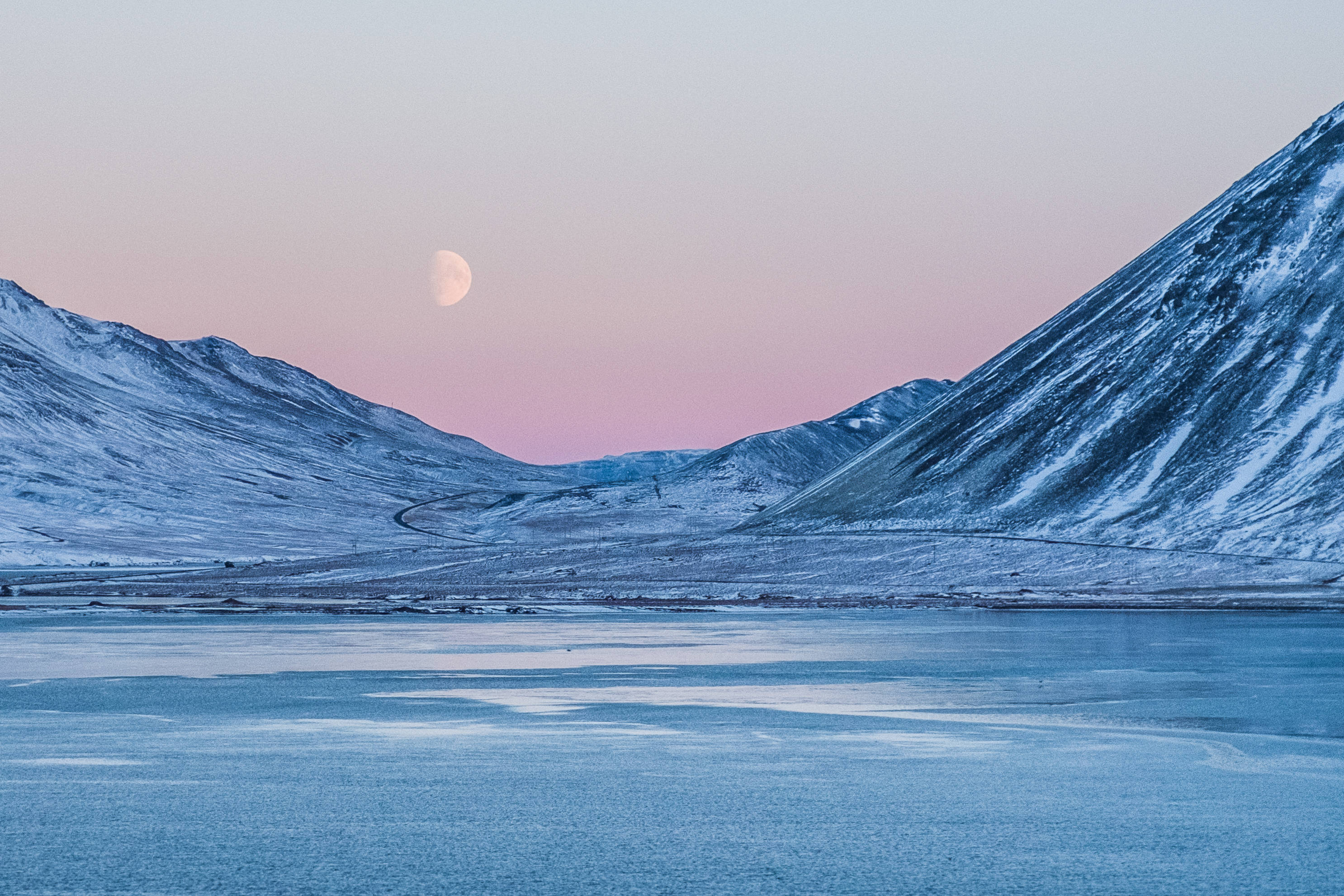 pink and blue twilight sky, crescent moon, snow-dusted mountains, 2K Desktop Wallpaper