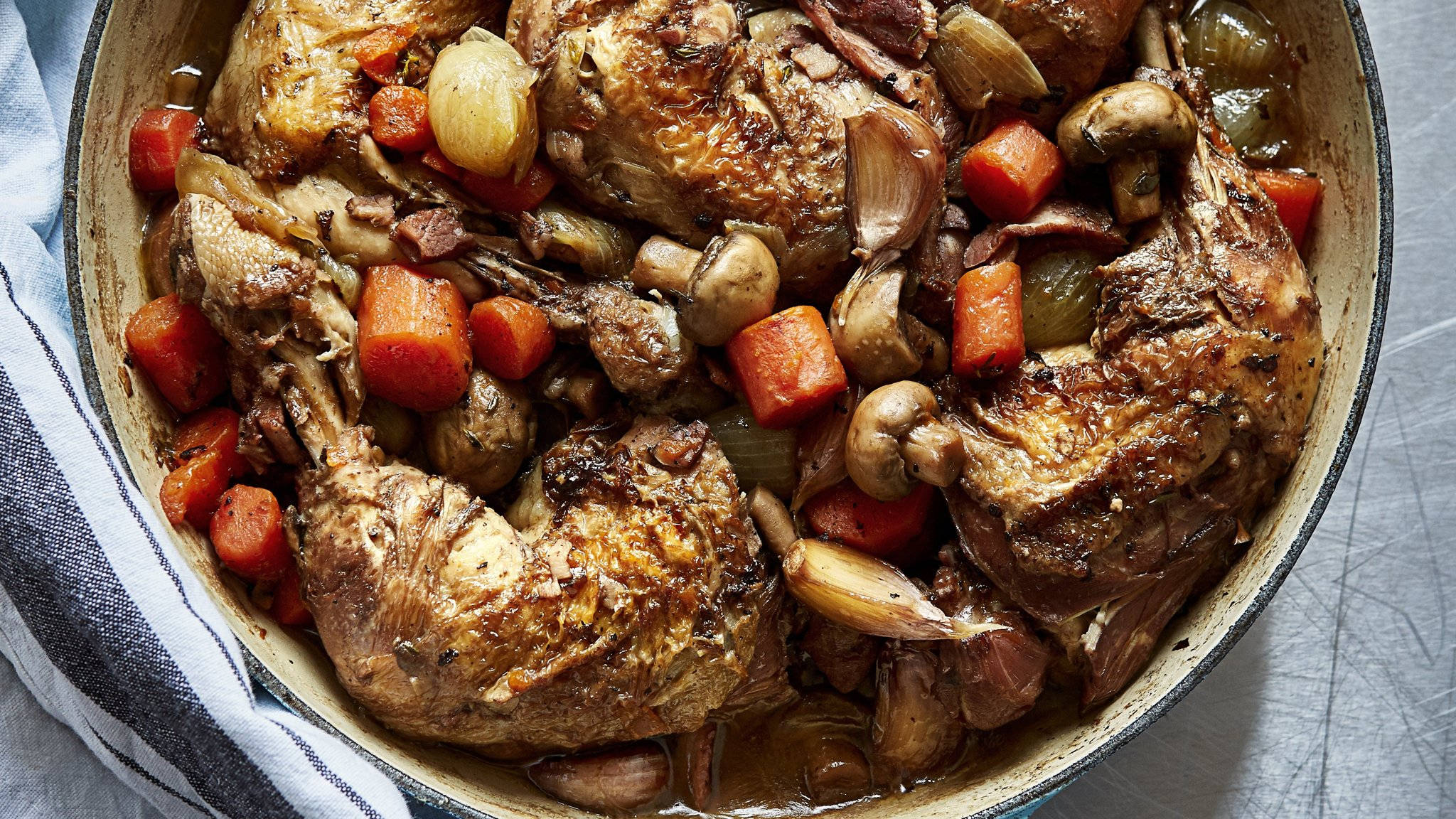 Coq Au Vin, rustic ceramic bowl, golden-brown roasted chicken legs, Full HD Desktop Wallpaper