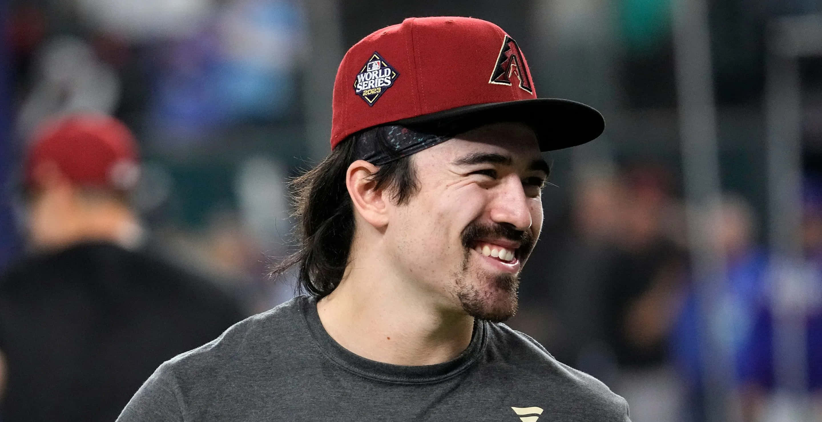Corbin Carroll, red World Series cap, gray shirt, 2K Desktop Wallpaper