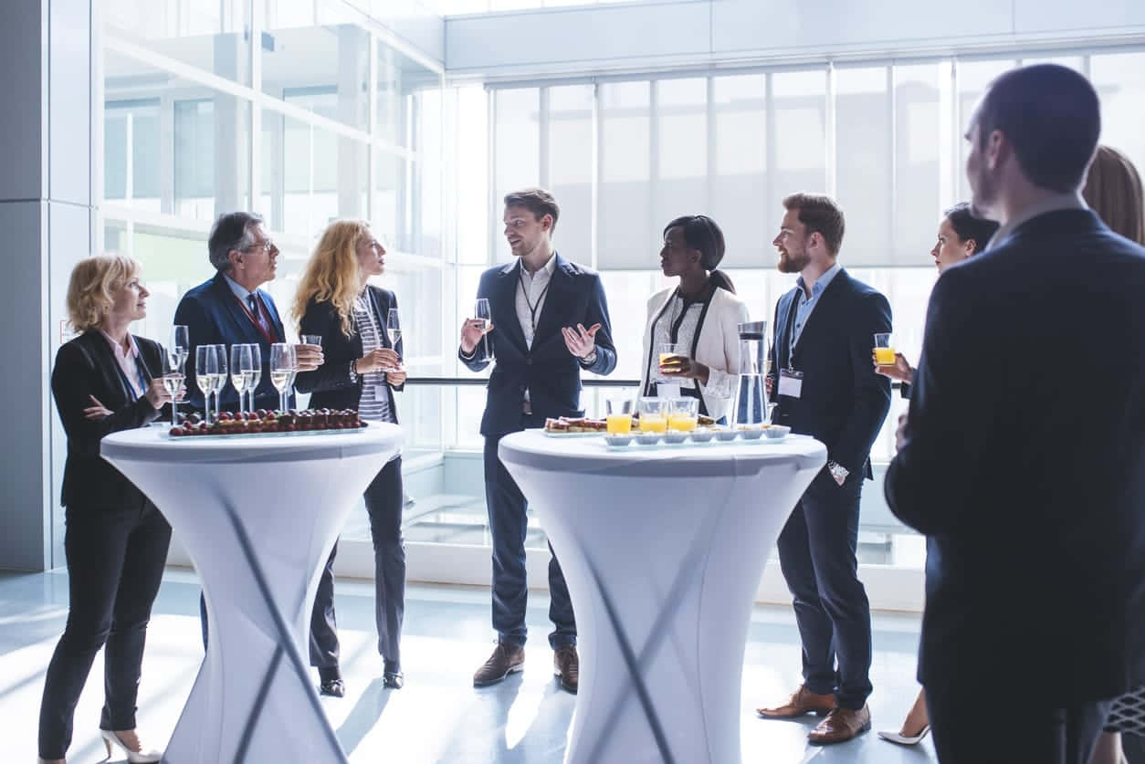 Corporate Event, modern white tables, bright glass-walled lobby, SD Desktop Wallpaper