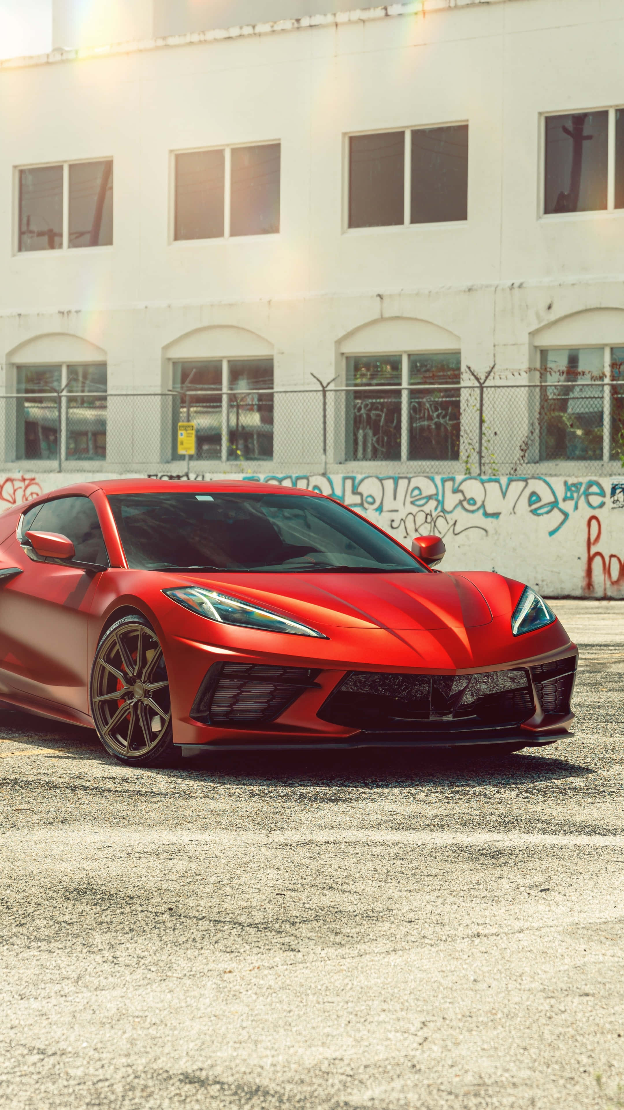 Red Corvette C8, glossy red, cracked asphalt, 4K Phone Wallpaper