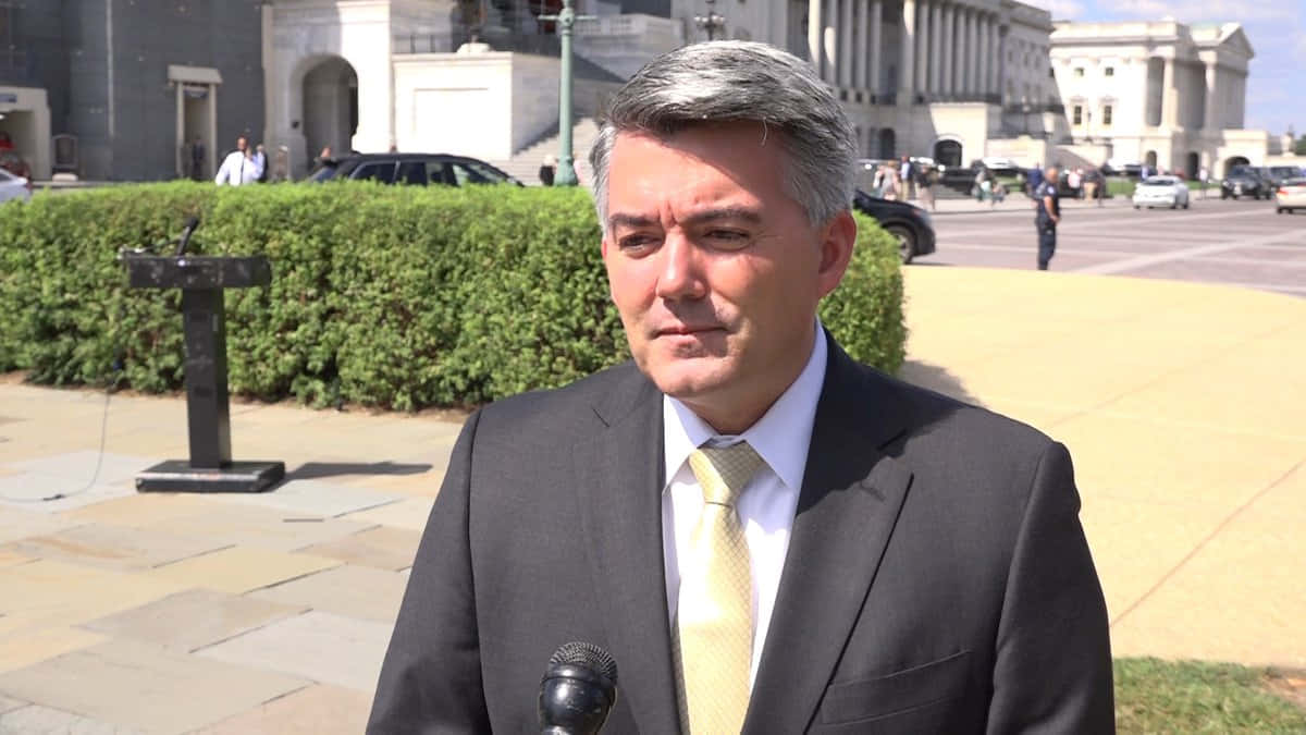 Cory Gardner, dark suit, yellow tie, SD Desktop Wallpaper