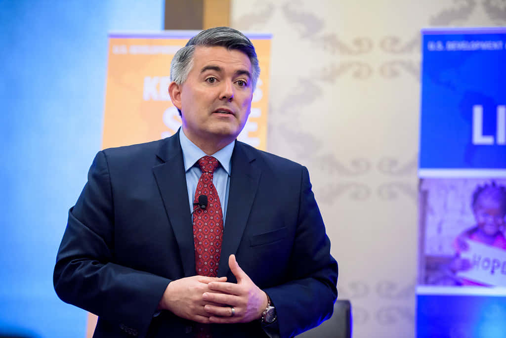 Cory Gardner, dark suit, red patterned tie, SD Desktop Wallpaper