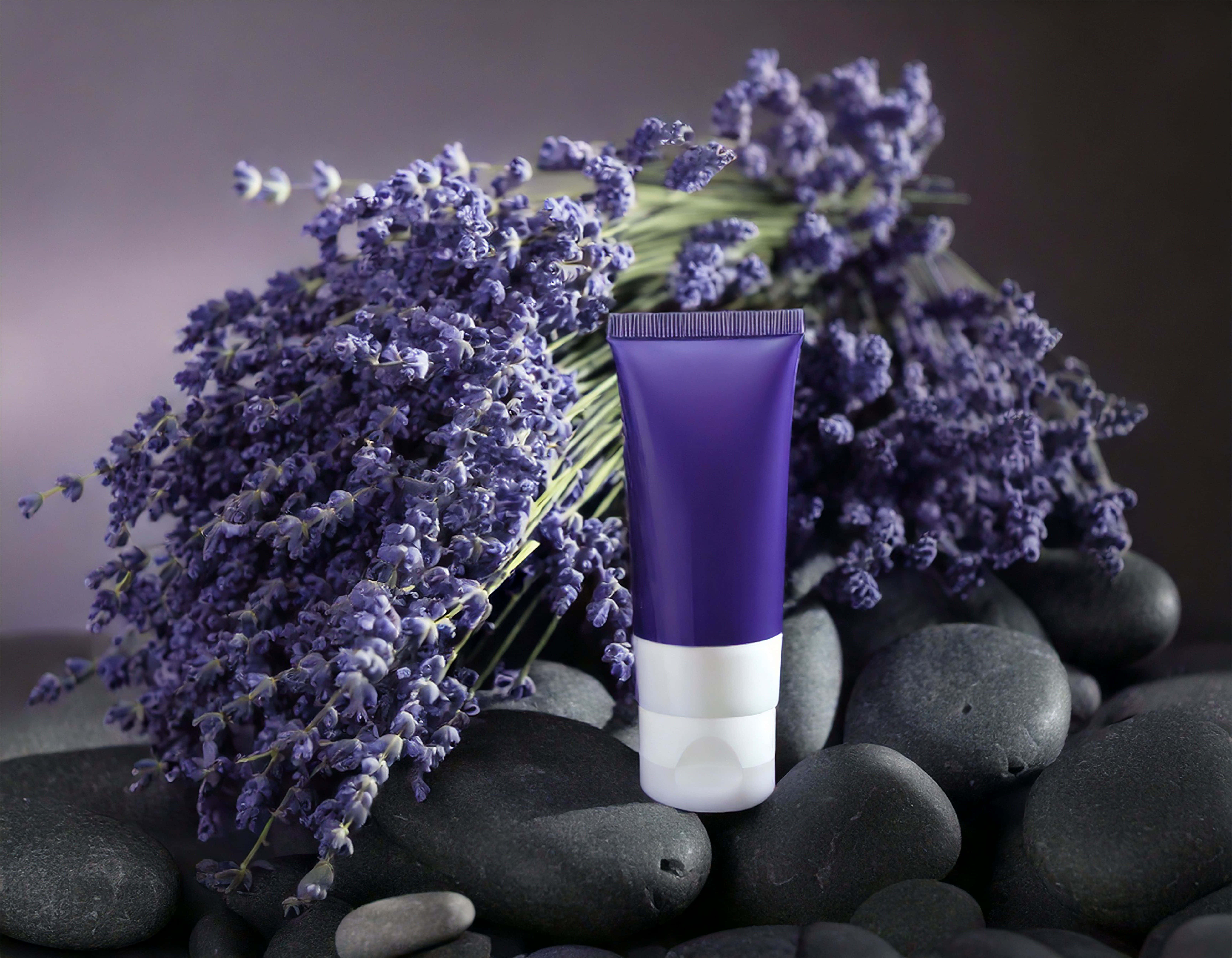 purple and white lotion tube, dark river stones, lavender flowers, 5K Desktop Wallpaper
