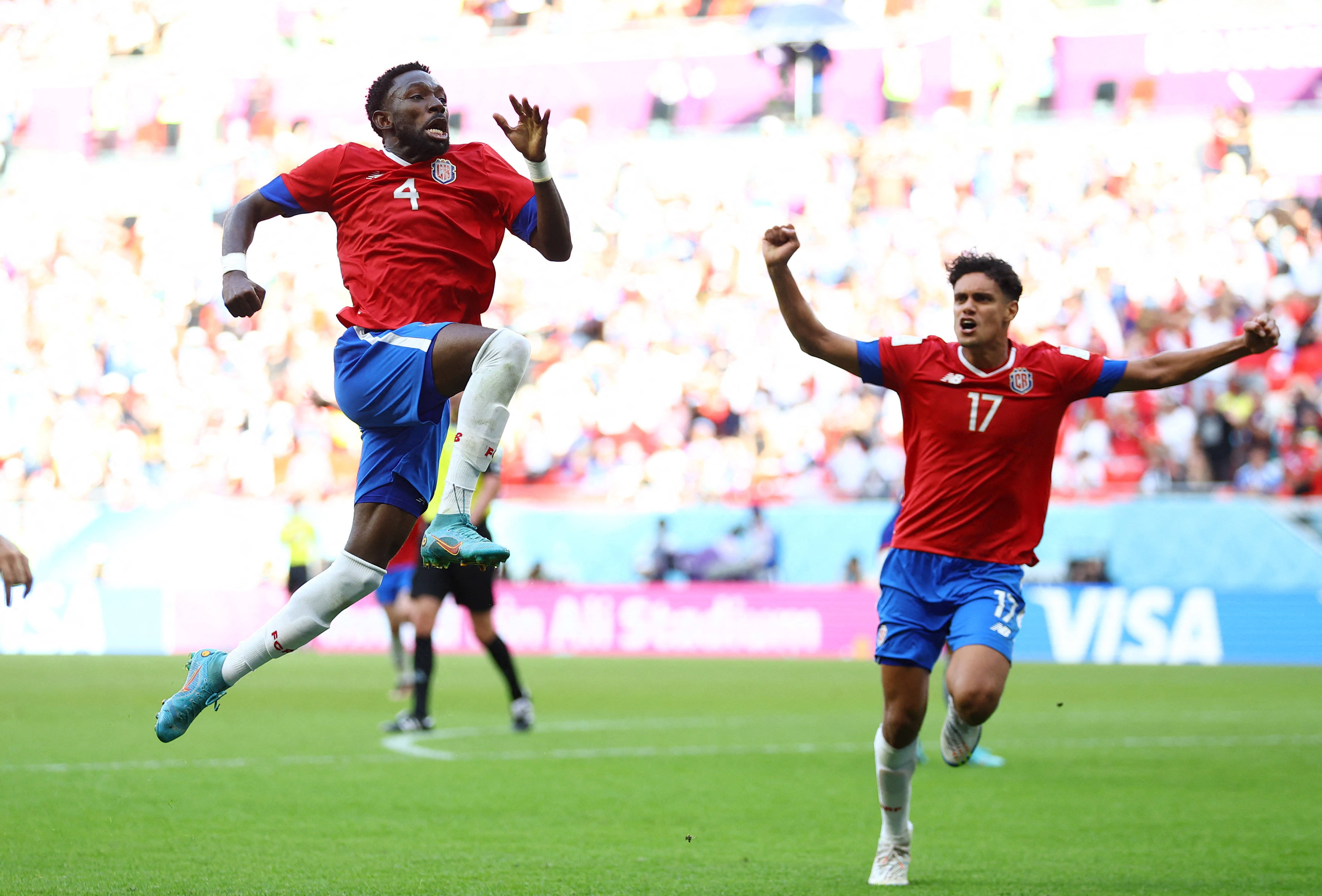 Costa Rica National Football Team, red and blue uniforms, vibrant green pitch, 4K Desktop Wallpaper