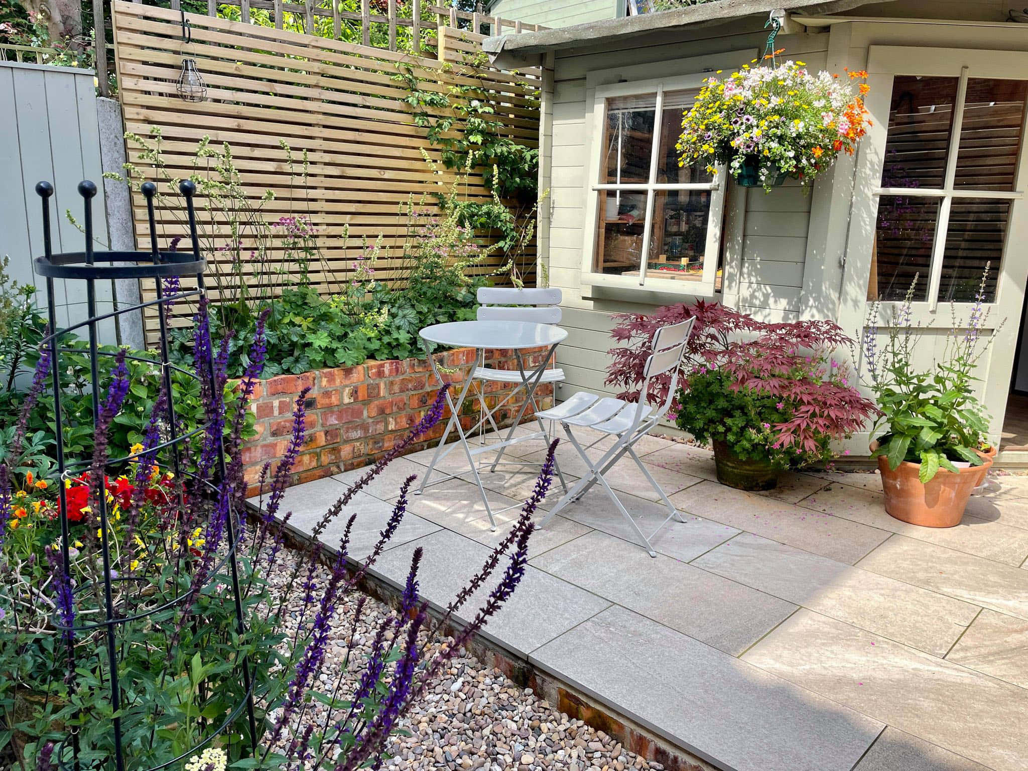 cottage garden, white bistro set, vibrant purple flowers, Full HD Desktop Wallpaper