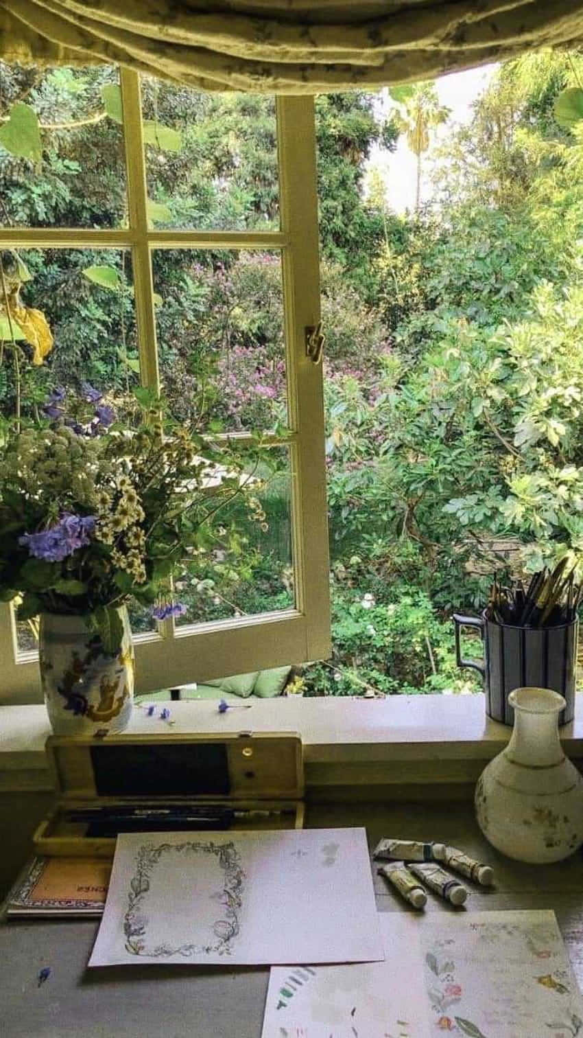 cottagecore inspired artist workspace, sunlit wooden window seat, lush green garden, HD Phone Wallpaper