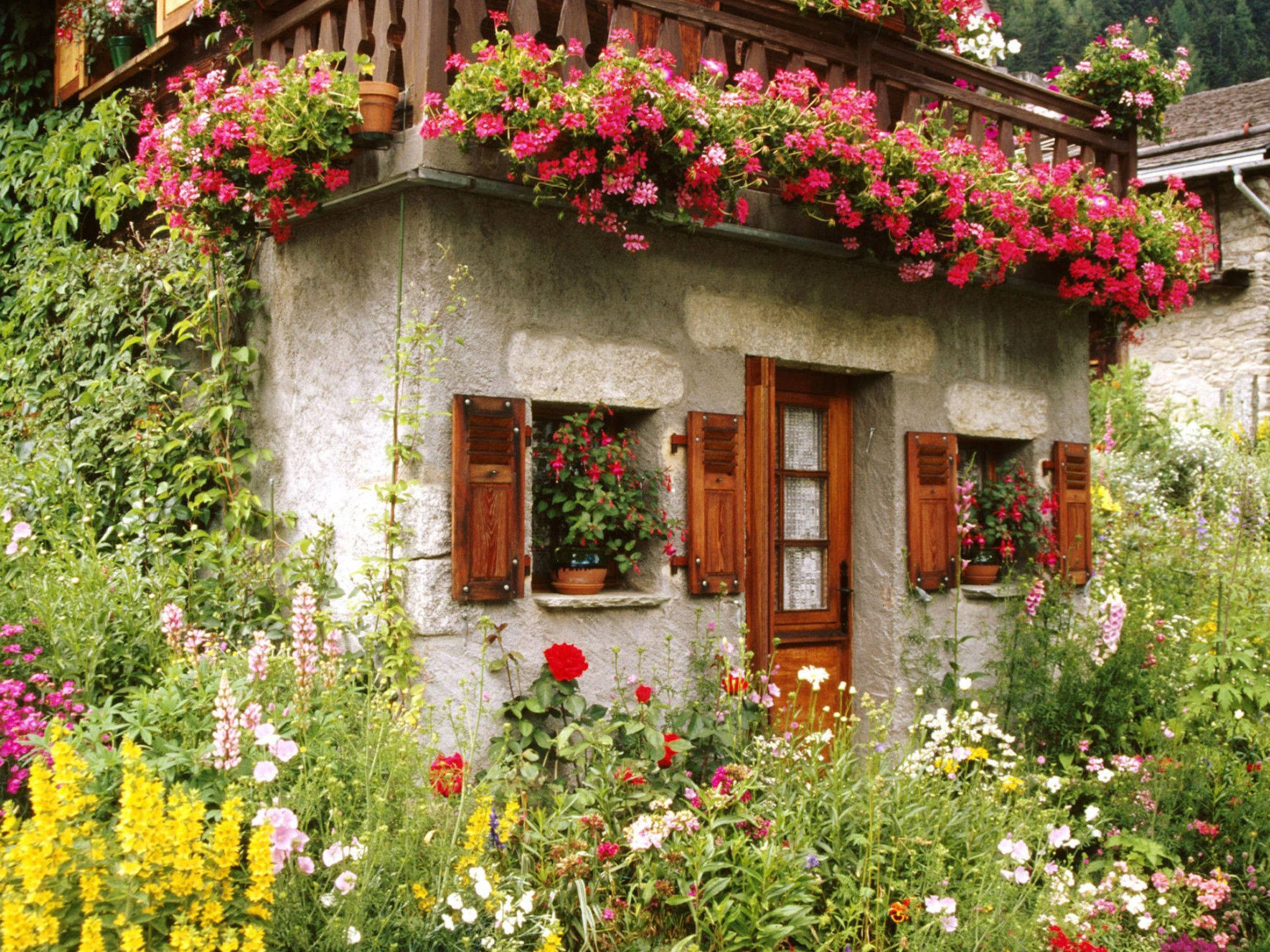 stone cottage, vibrant pink flowers, balcony, Full HD Desktop Wallpaper