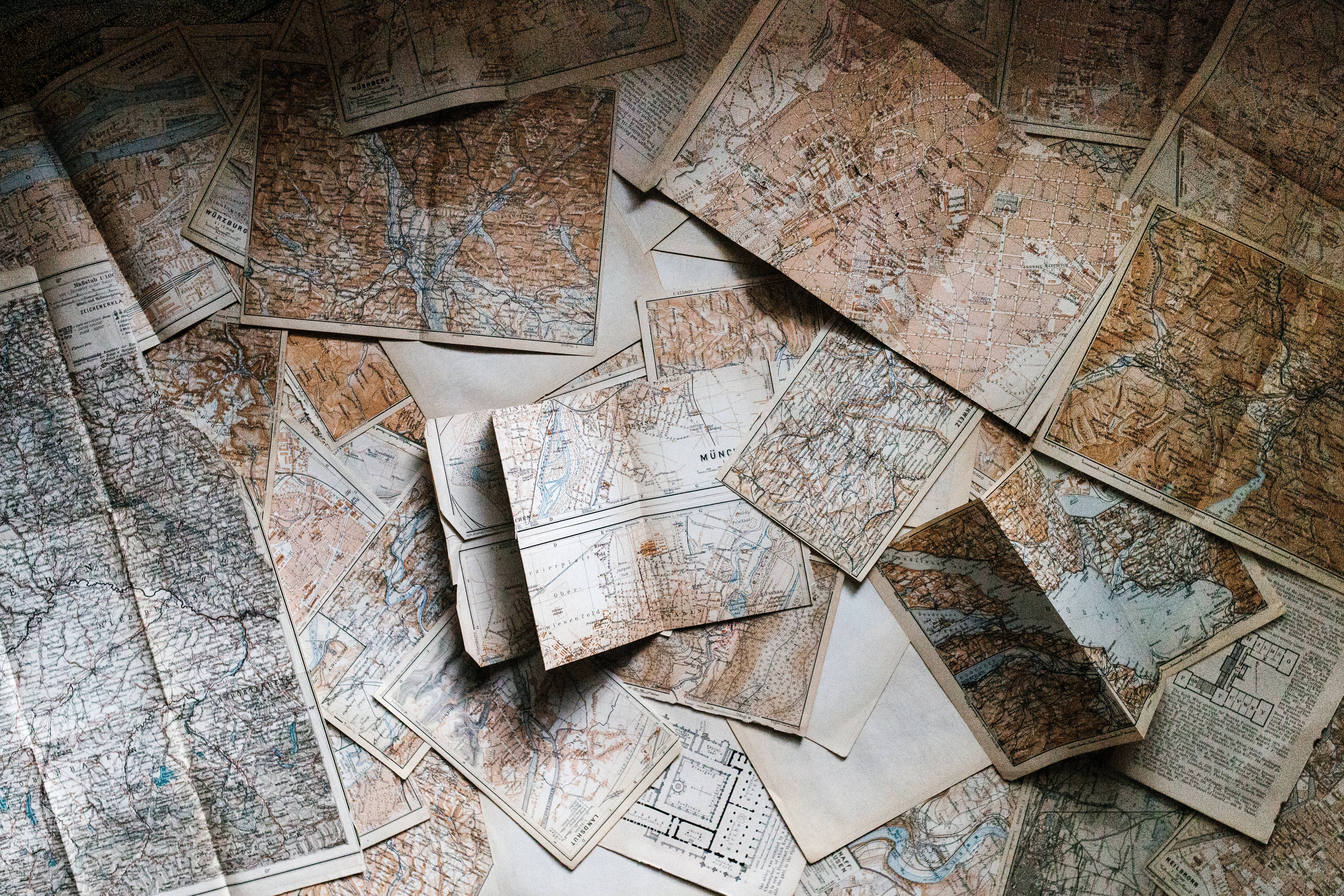 Countries Map Collection, vintage paper maps, faded sepia tones, 5K Desktop Wallpaper