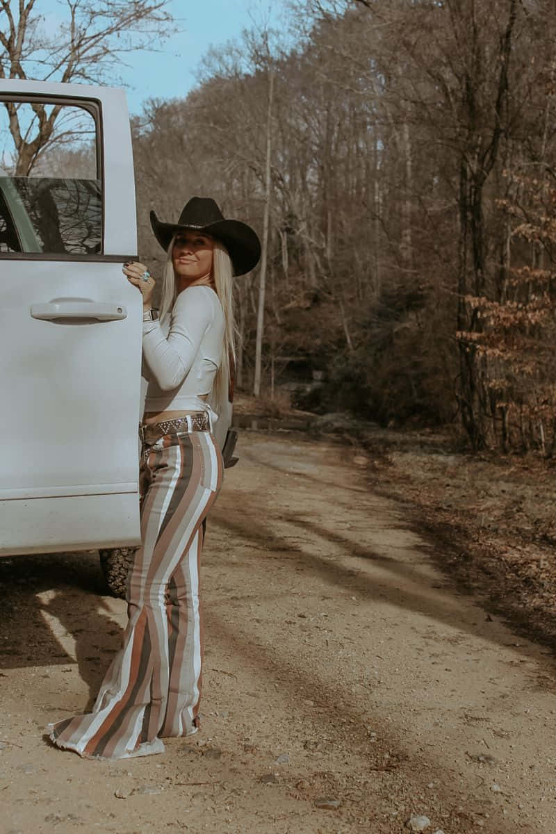 black cowboy hat, striped bell-bottoms, white truck, SD Phone Wallpaper