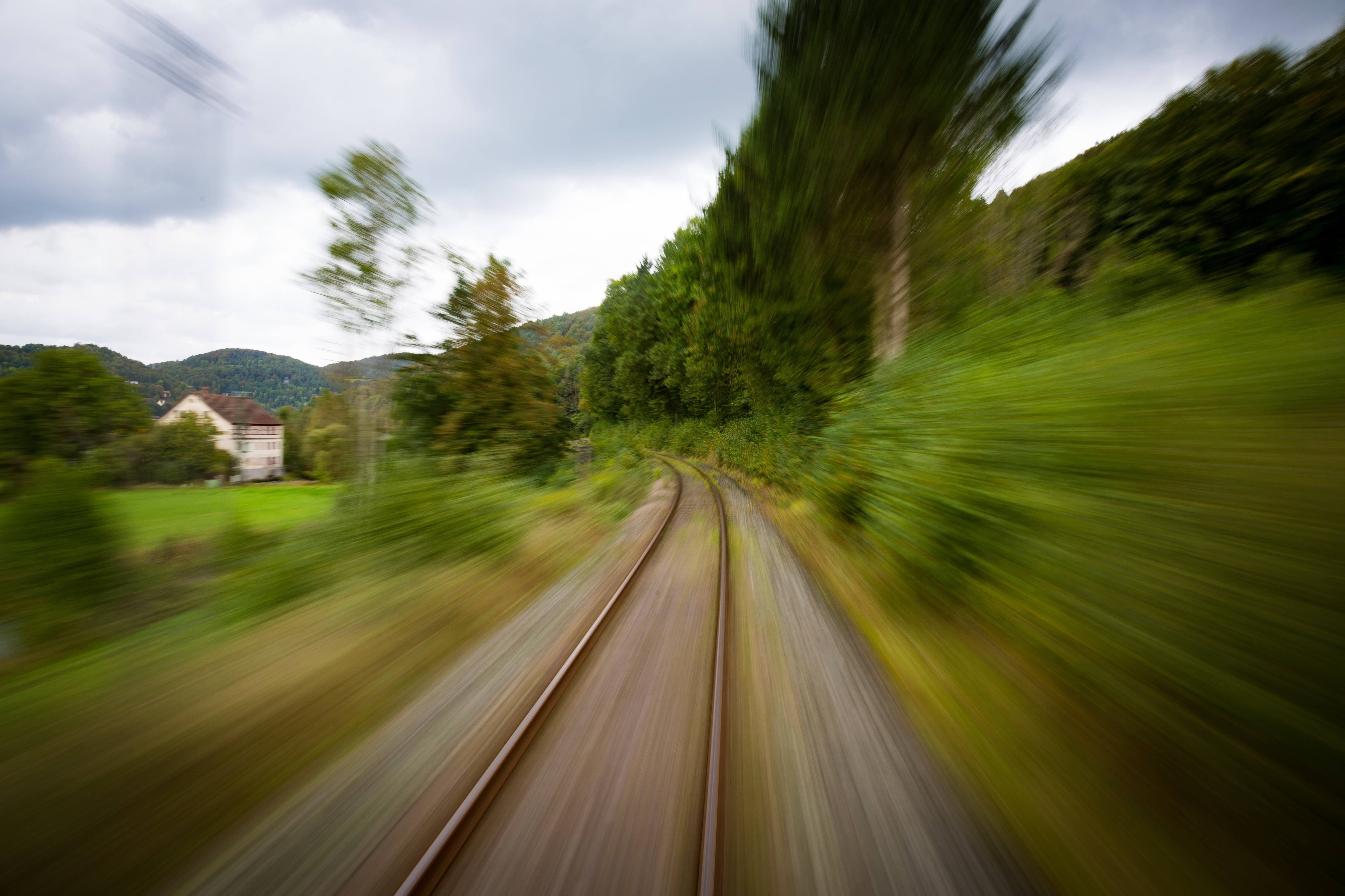 nostalgic railroad, speeding train, lush green forest, 5K Desktop Wallpaper