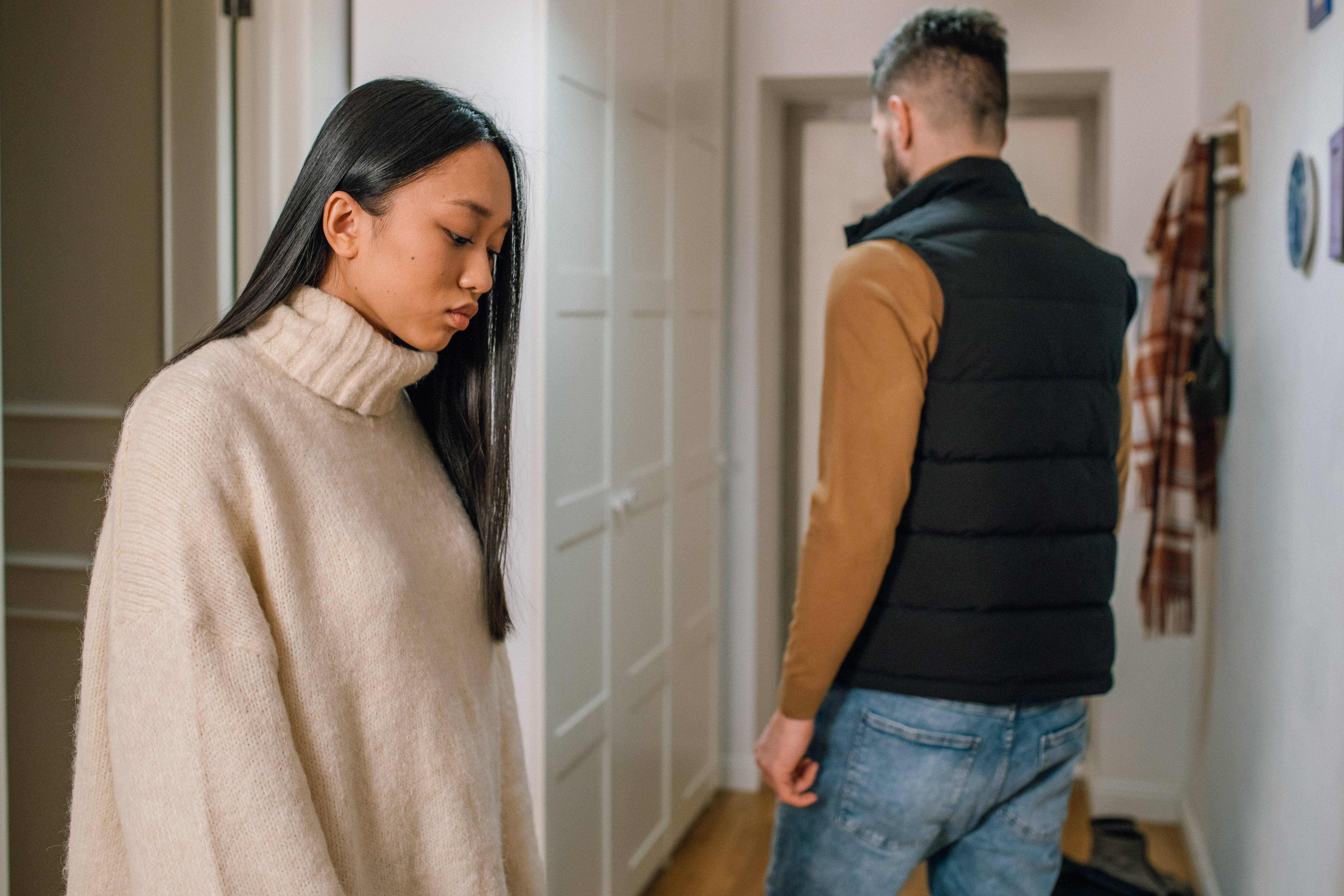 beige sweater, black vest, hallway, 5K Desktop Wallpaper