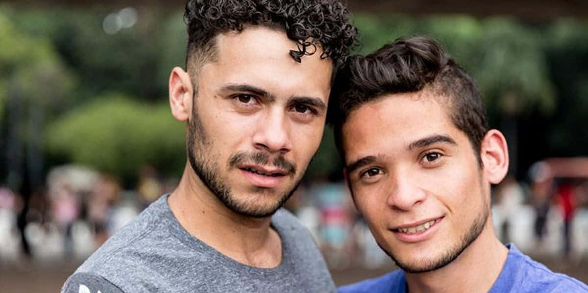 gay latino couple, curly hair, sunlit outdoor setting, SD Desktop Wallpaper