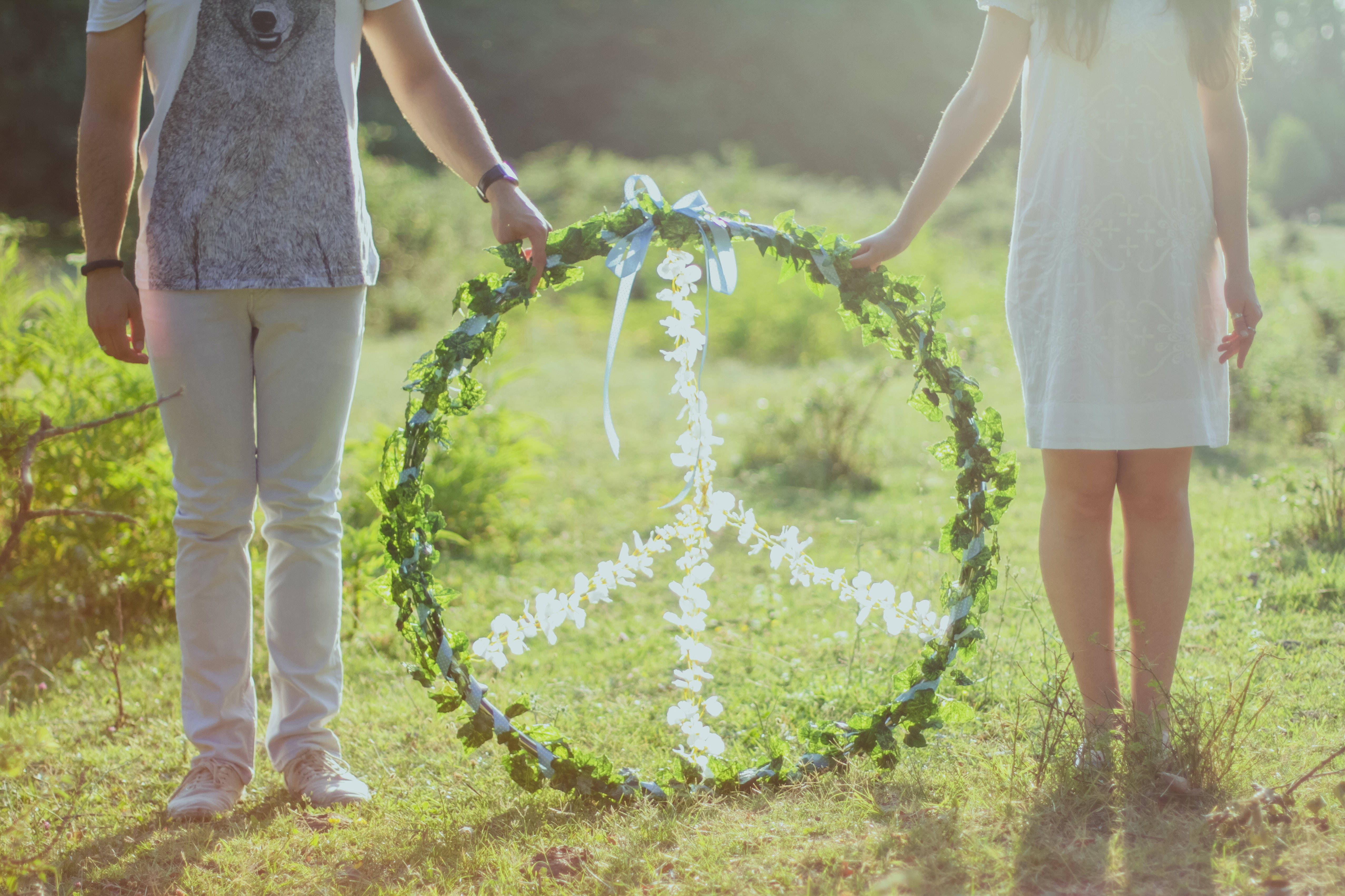 Couple Hands, floral peace sign, lush green wreath, 4K Desktop Wallpaper