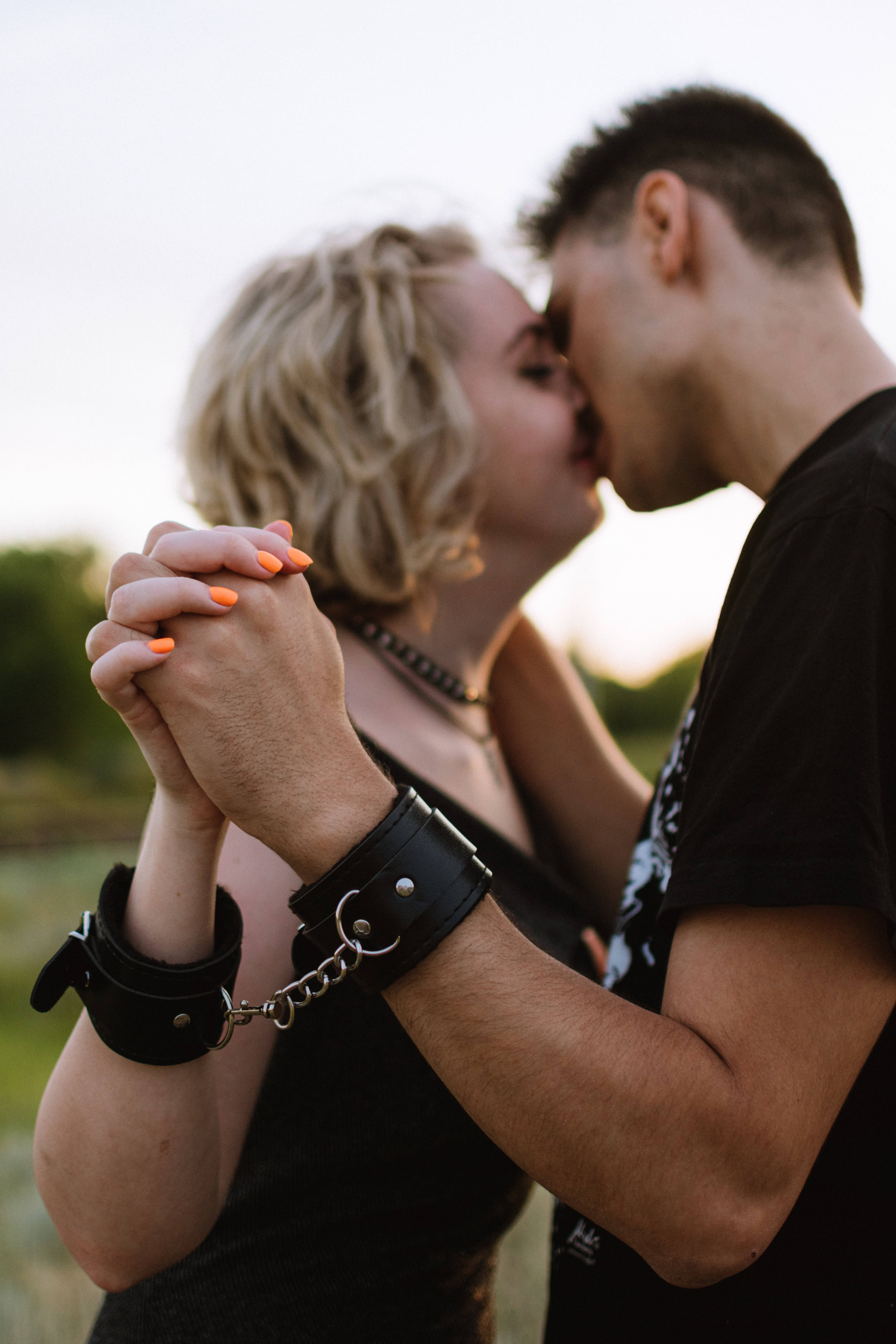 Chained Couple Hands, sunset, black leather cuffs, 5K Phone Wallpaper