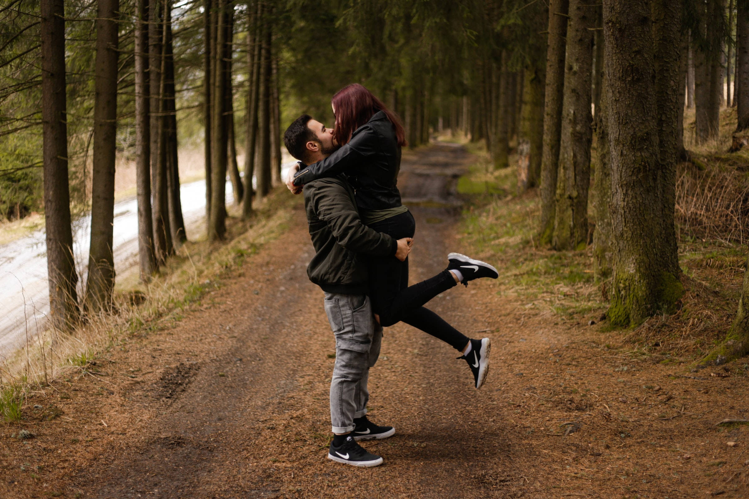 Couple Hugging Catcher Hug By Trees, forest path, tall evergreen trees, Full HD Desktop Wallpaper