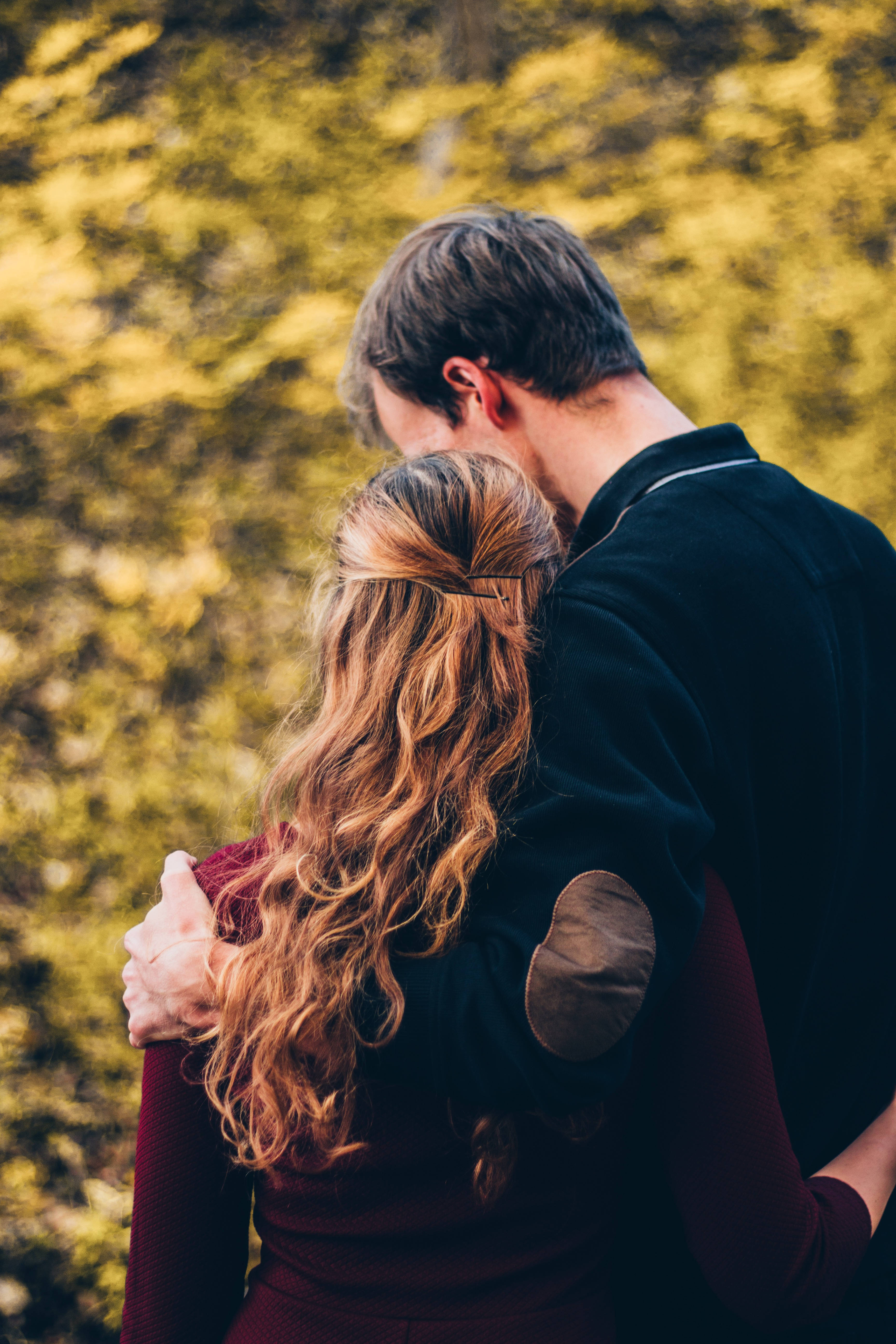 couple, golden autumn foliage, embrace, 5K Phone Wallpaper
