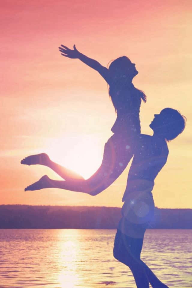 Happy Sunset Couple, glowing sunset, water, SD Phone Wallpaper