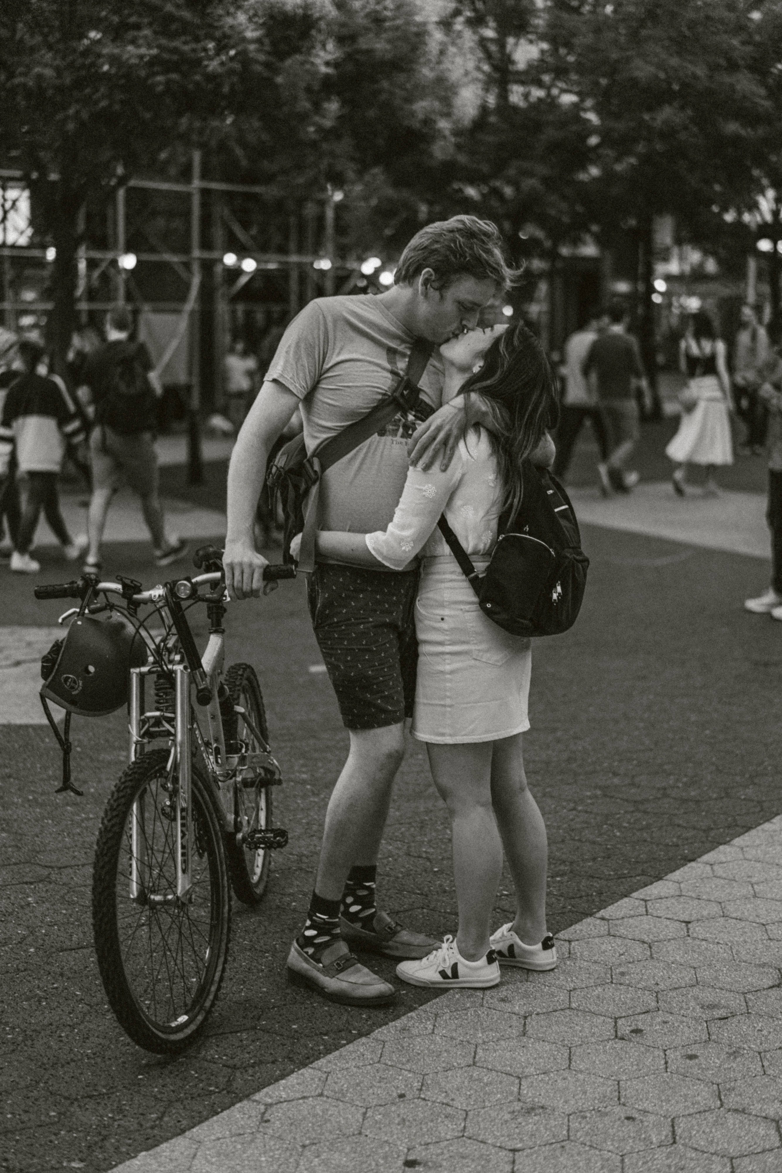 bicycle, hexagonal-paved urban sidewalk, black and white photo, 4K Phone Wallpaper