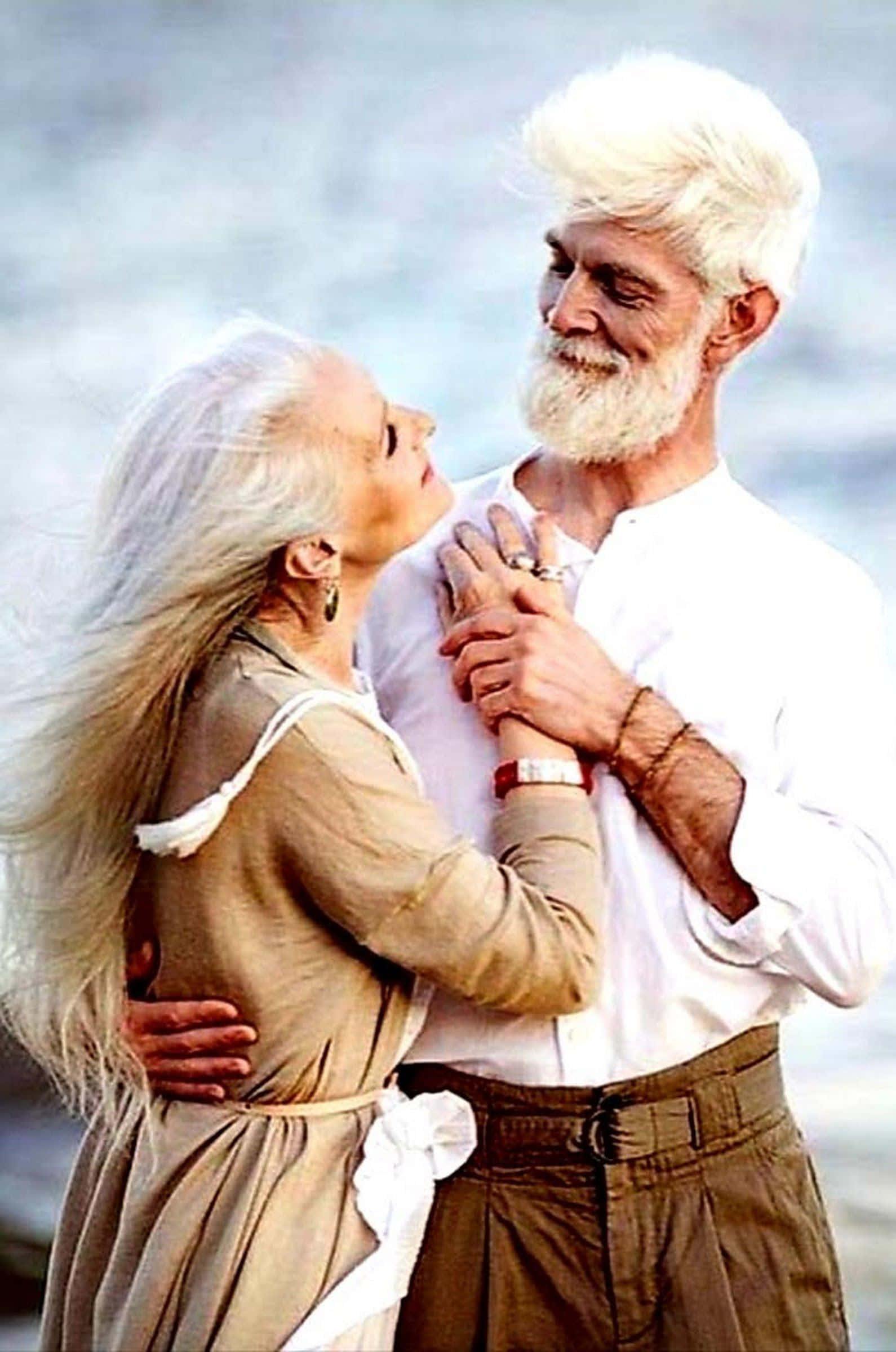 old couple, flowing white hair, embraces tenderly, Full HD Phone Wallpaper
