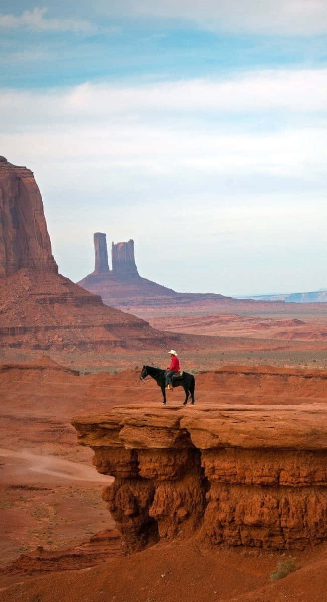 cowboy iphone, black horse, red rock cliff, SD Phone Wallpaper