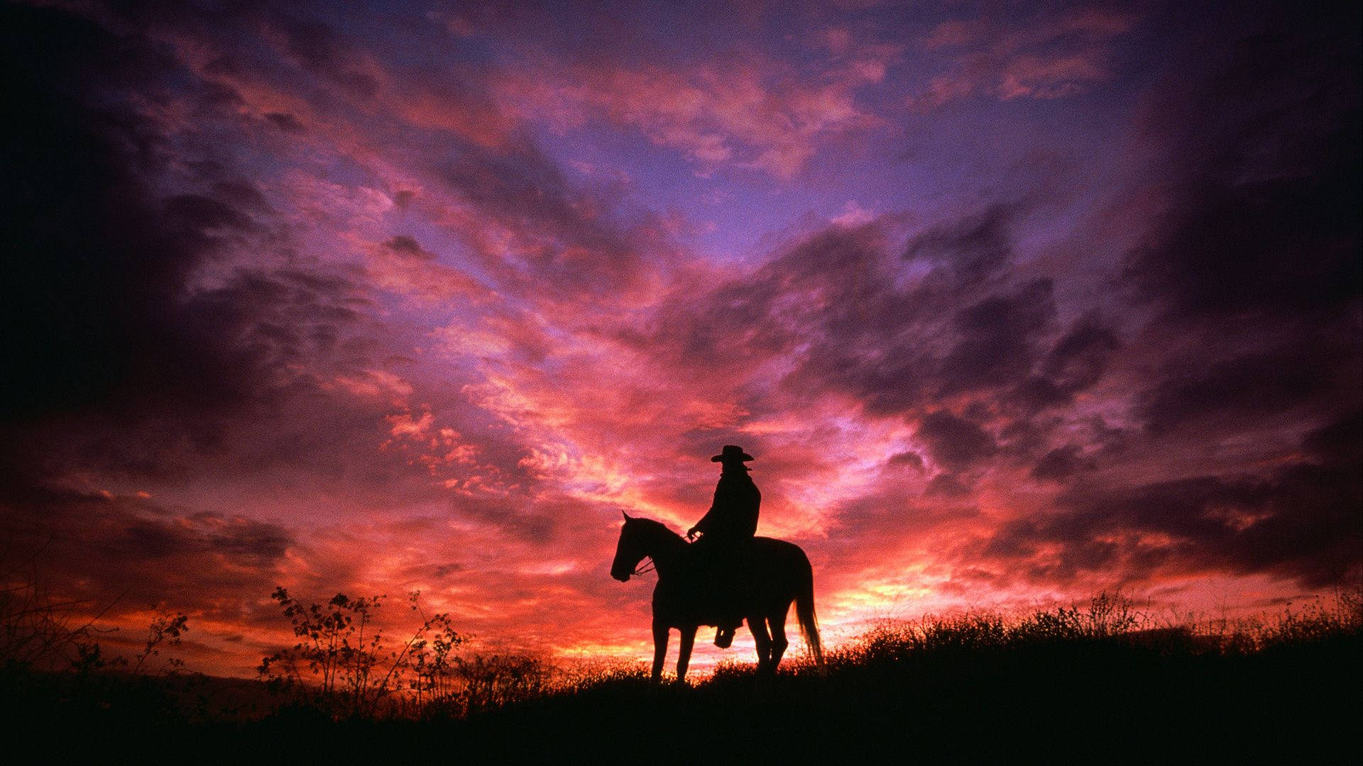 Red Sky Cowgirl, fiery sunset sky, swirling purple and orange clouds, Full HD Desktop Wallpaper