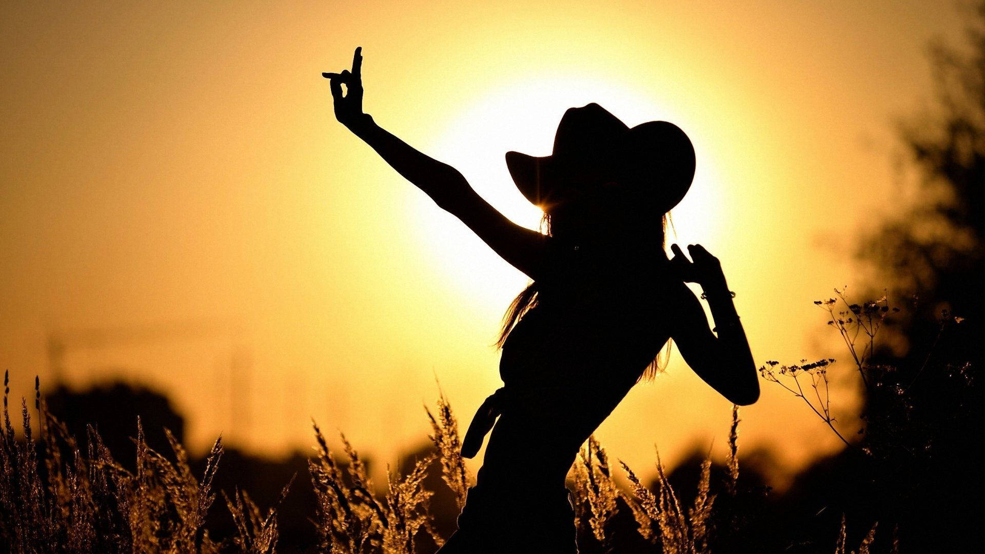 dancing cowgirl, cowboy hat, glowing sunset sky, Full HD Desktop Wallpaper