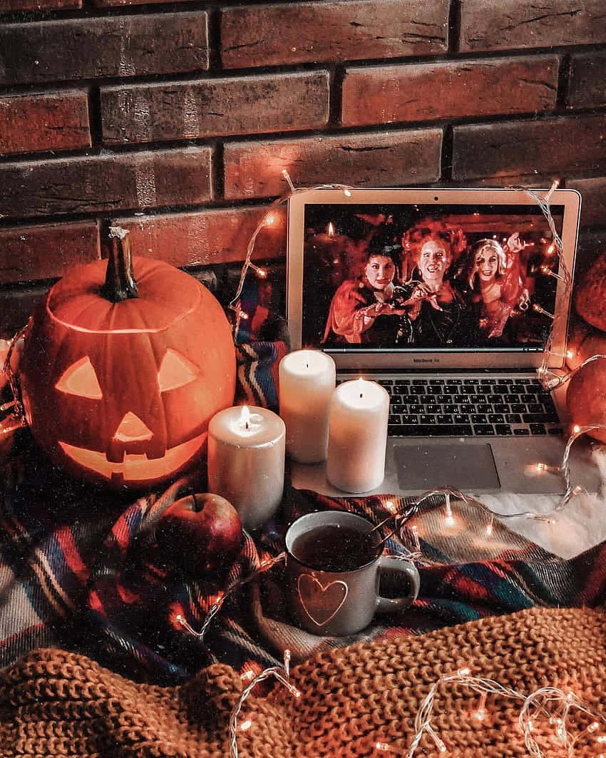 carved pumpkin, lit candles, string lights, SD Phone Wallpaper