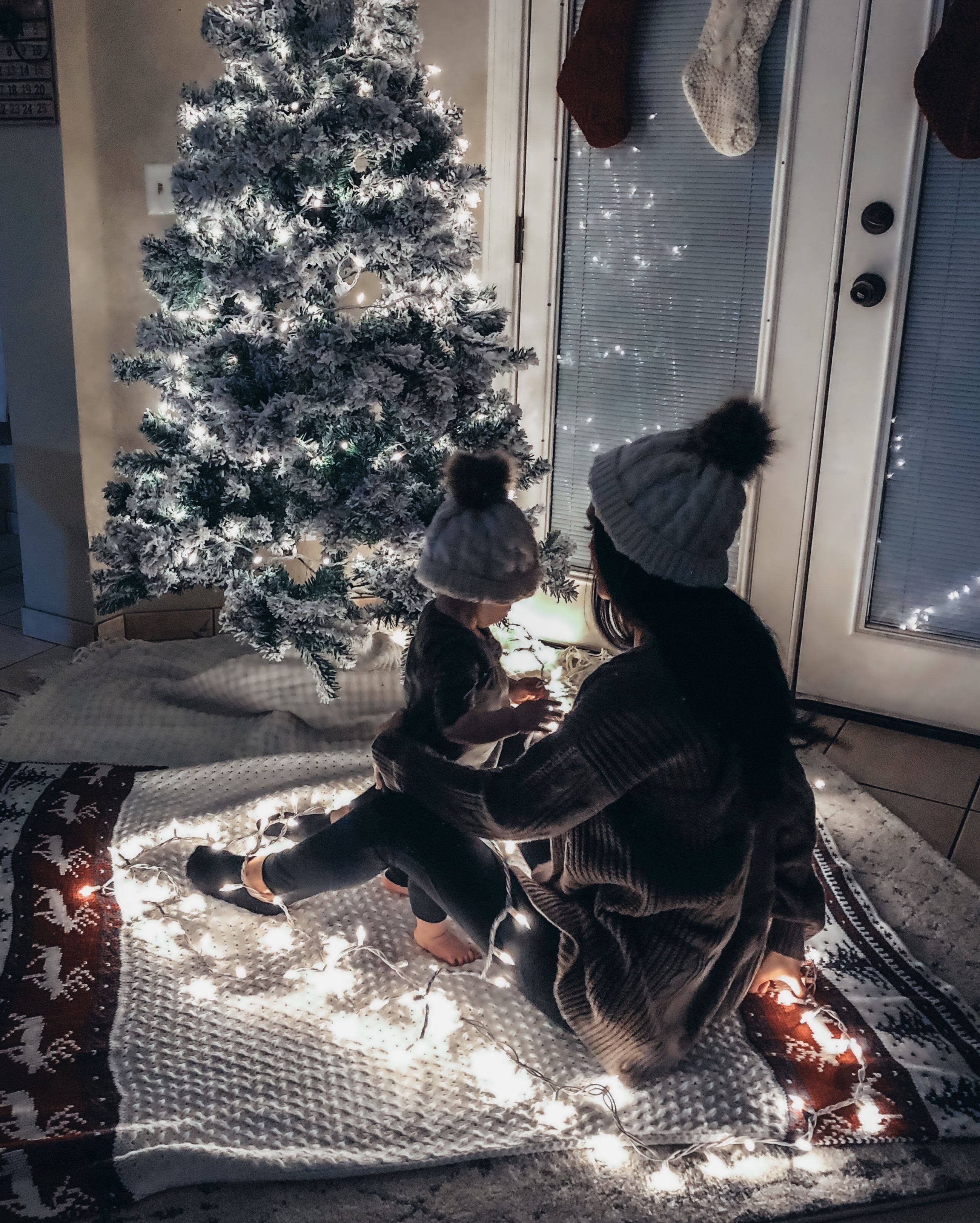 Cozy Christmas Aesthetic Tree, flocked Christmas tree, twinkling fairy lights, 2K Phone Wallpaper