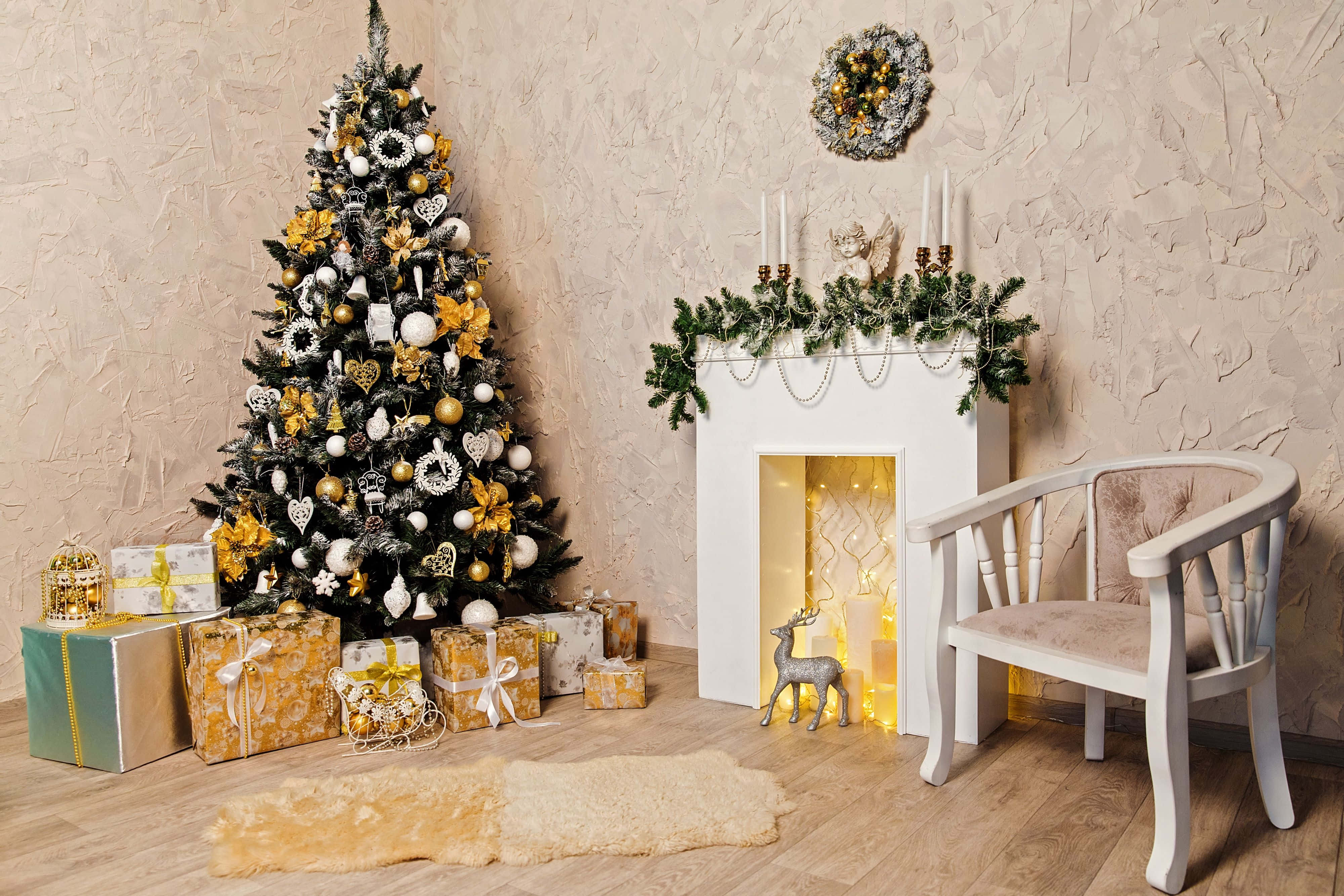 Elegant Christmas Treeand Fireplace Decor, gold and white ornaments, fireplace adorned with greenery and candles, 4K Desktop Wallpaper