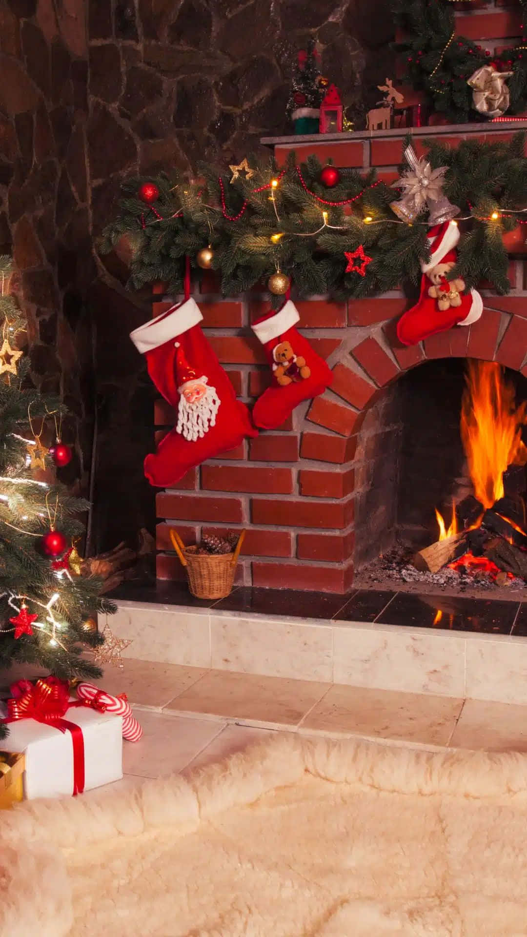 Cozy Christmas Fireplace Scene, crackling fire, three red stockings, Full HD Phone Wallpaper