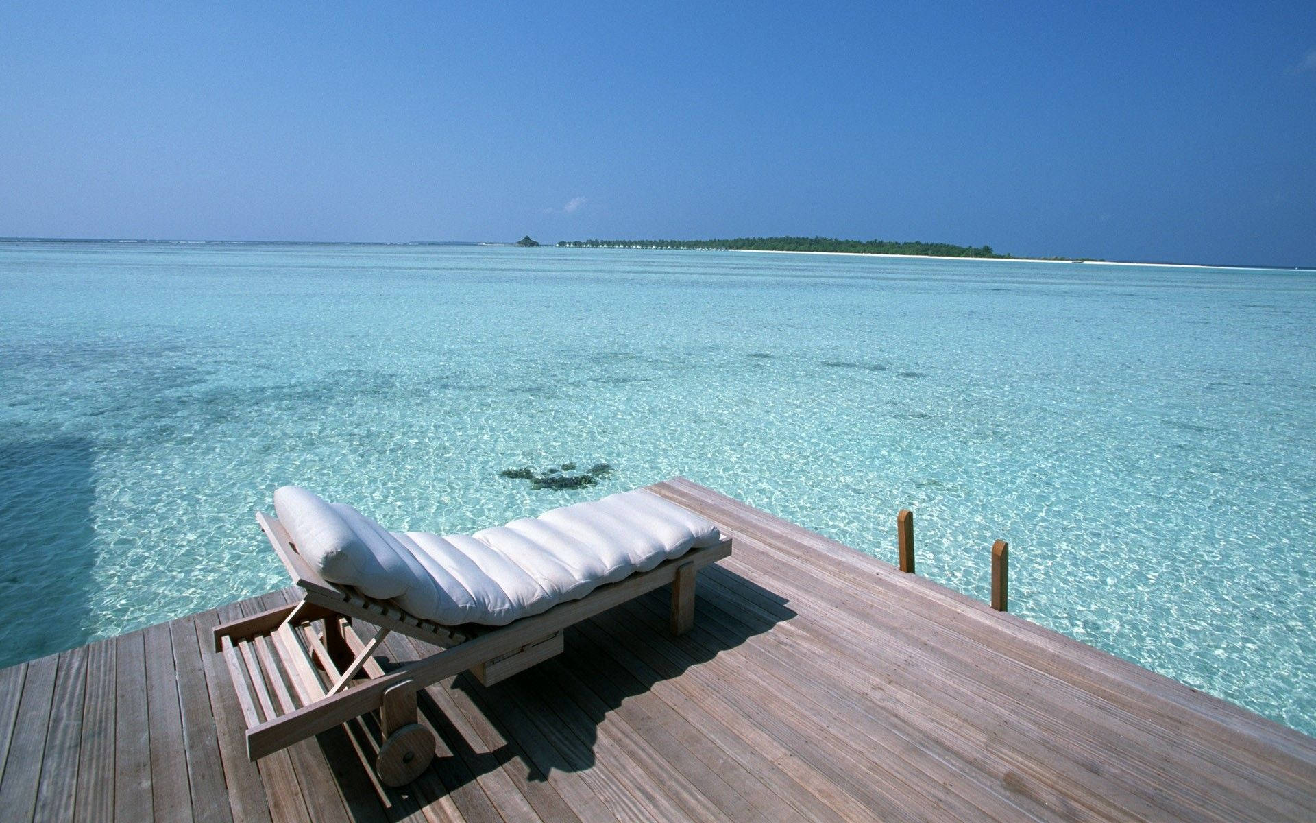 white lounge chair, wooden deck, crystal clear turquoise waters, Full HD Desktop Wallpaper