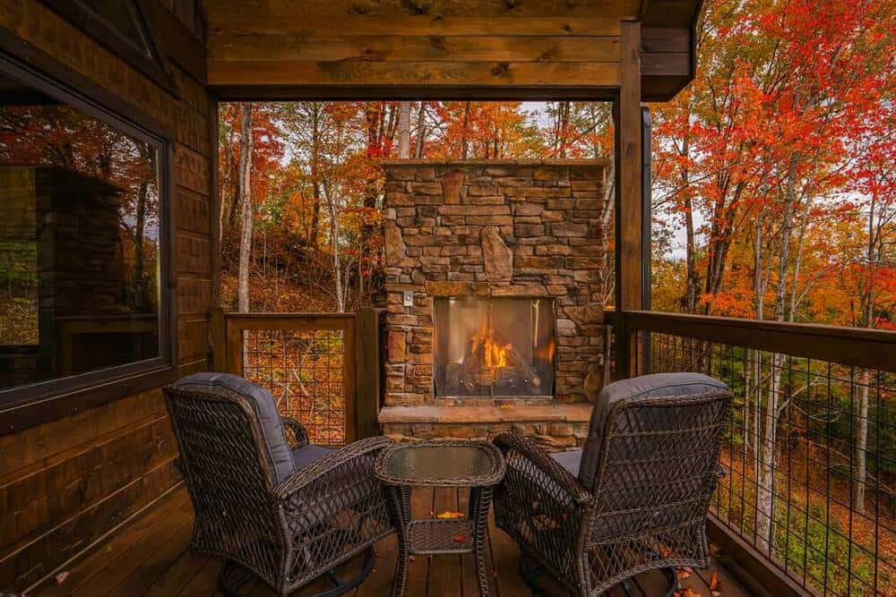 cozy Fall cabin, vibrant autumn foliage, wicker chairs, SD Desktop Wallpaper