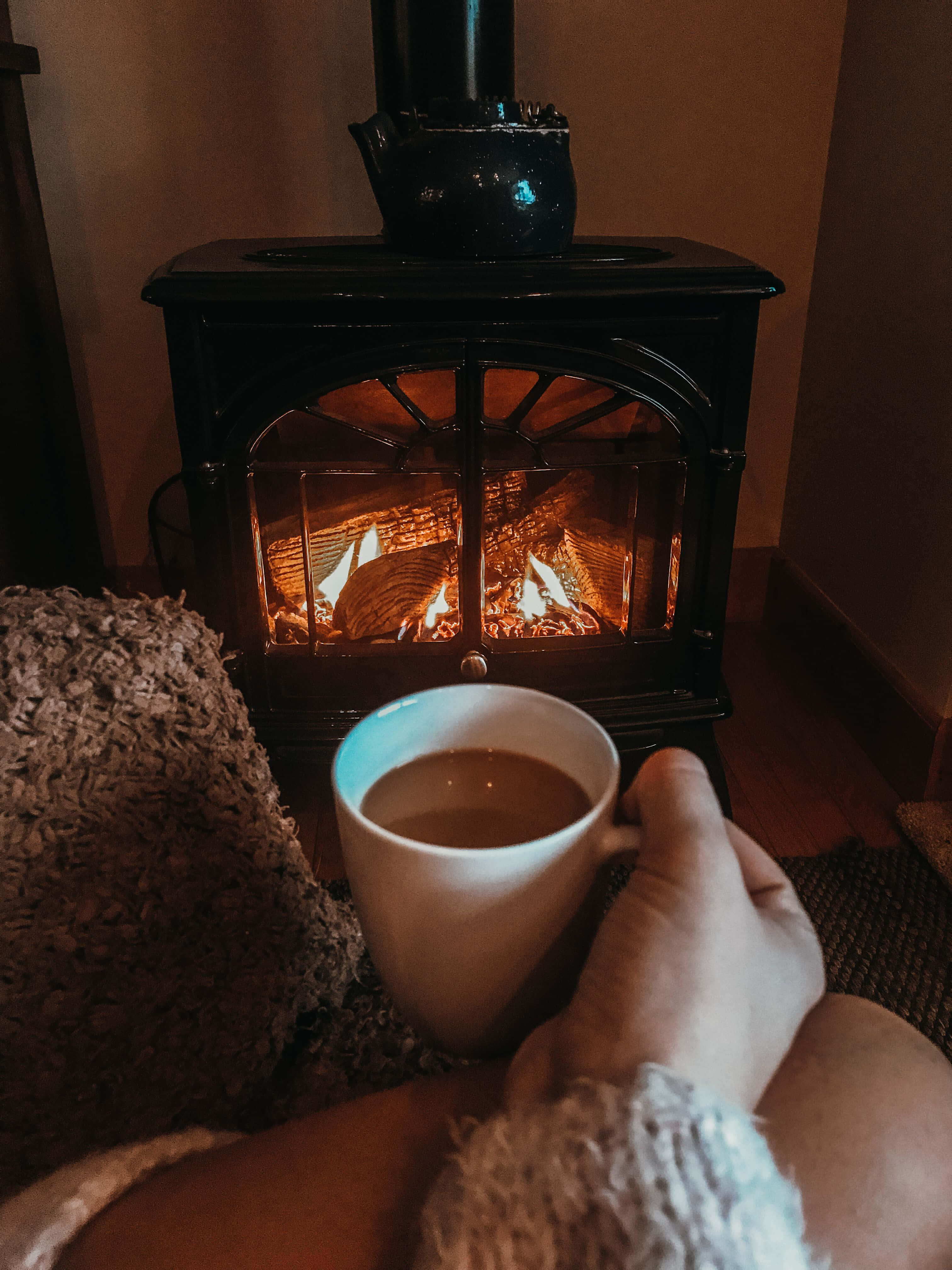 cozy fire, wood-burning stove, warm mug, 4K Phone Wallpaper