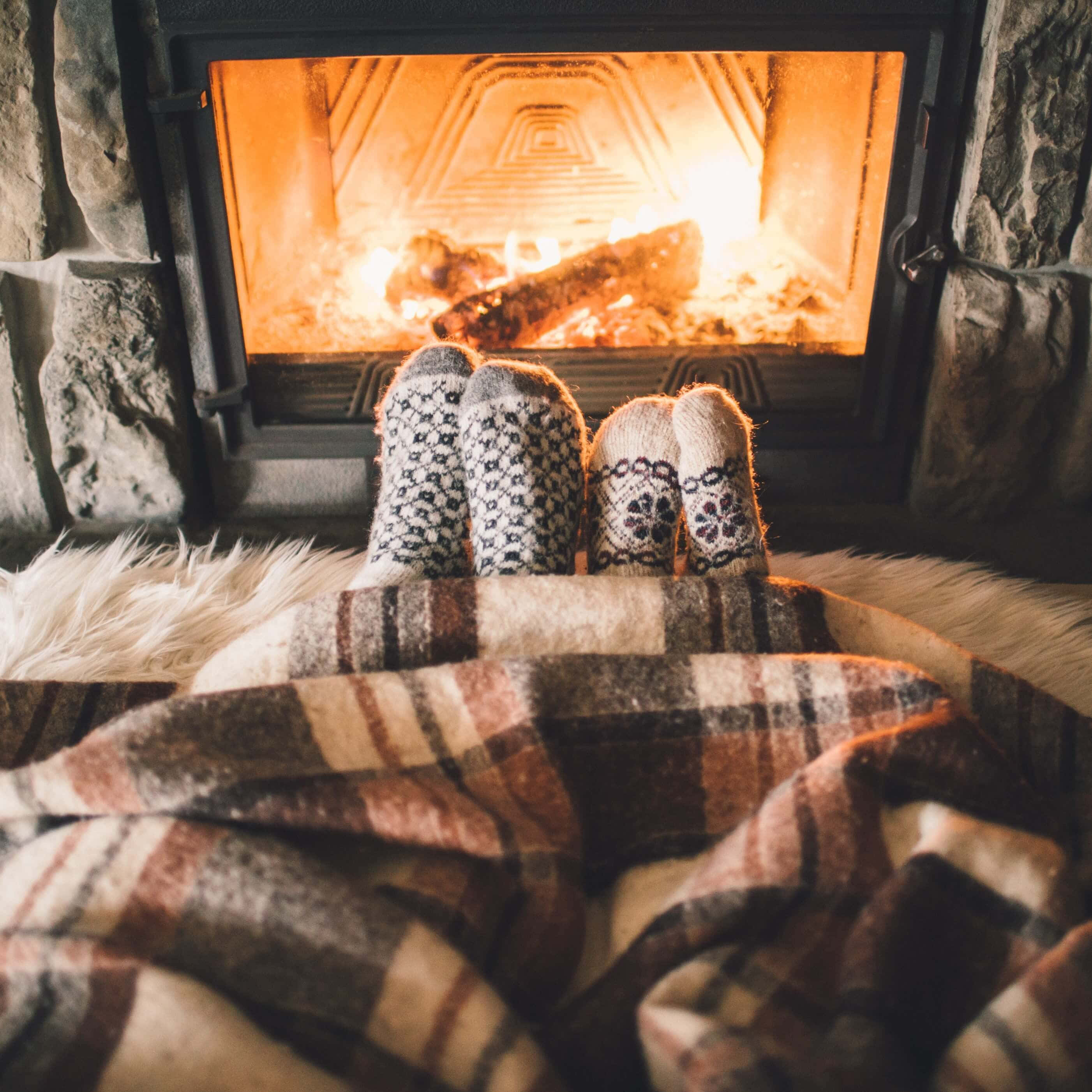 cozy fire, plaid blanket, glowing stone fireplace, 2K Desktop Wallpaper