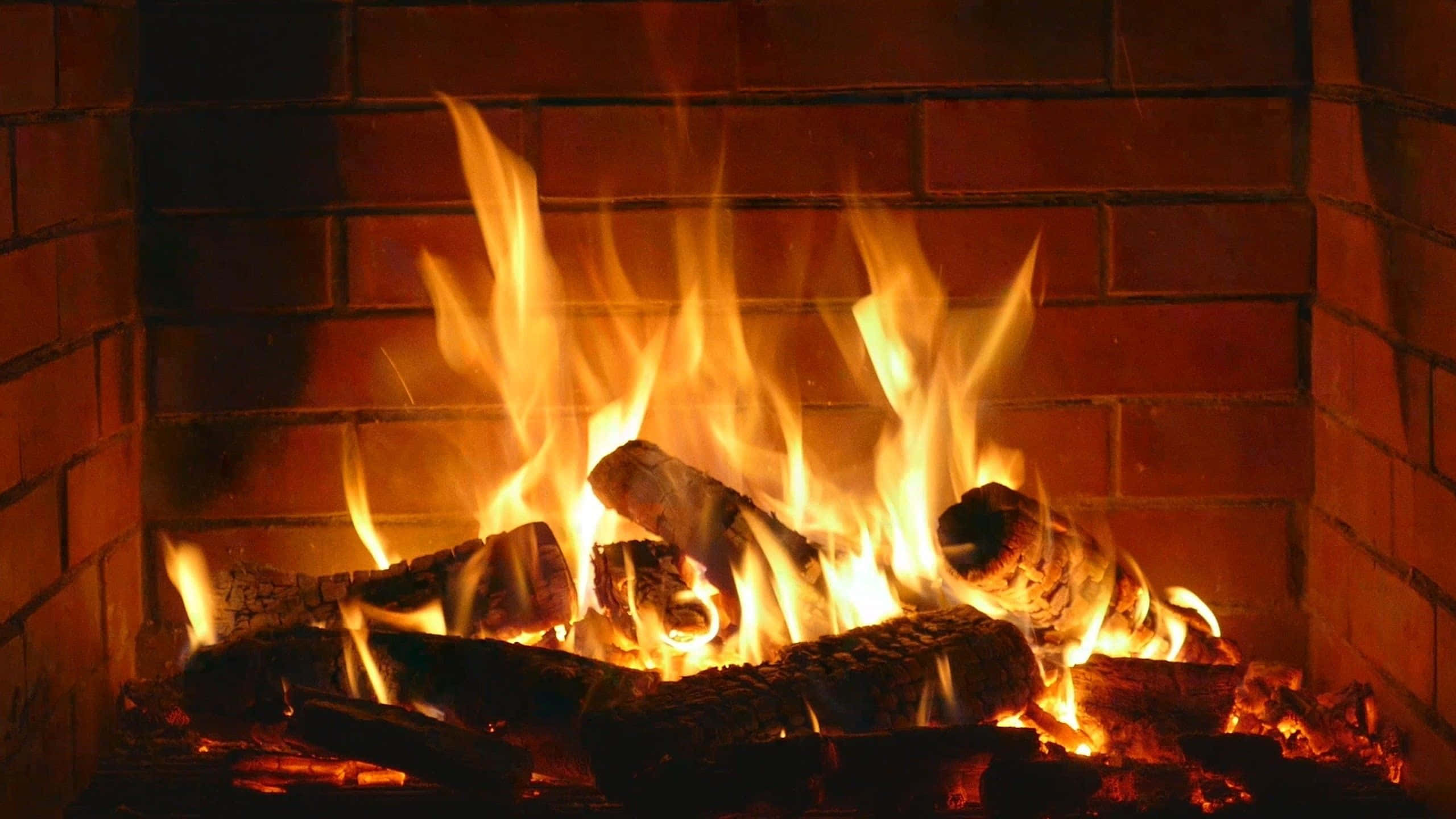 cozy fire, golden flames, crackling logs, 2K Desktop Wallpaper