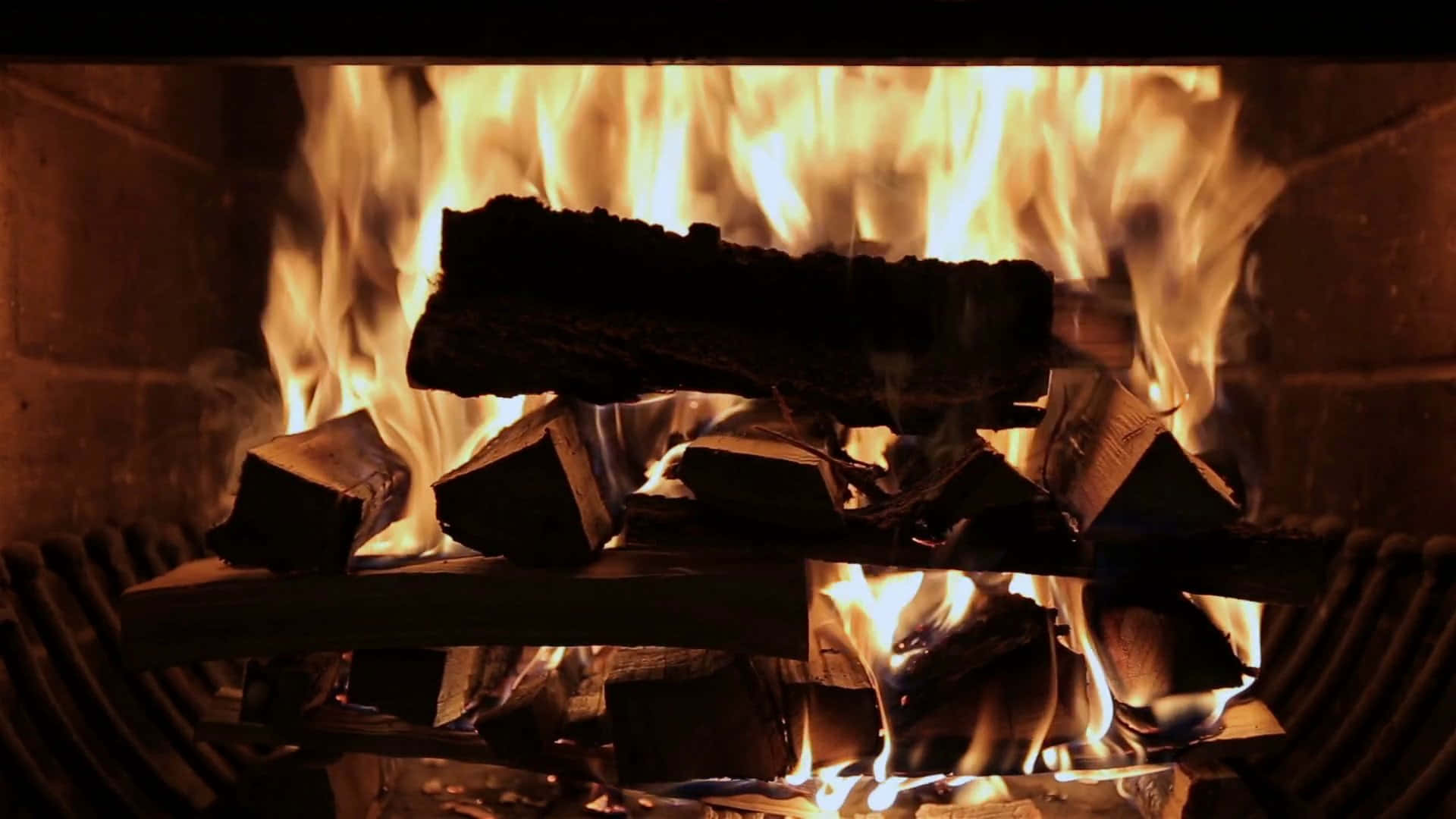 Cozy Fire, orange flames, dark logs, Full HD Desktop Wallpaper