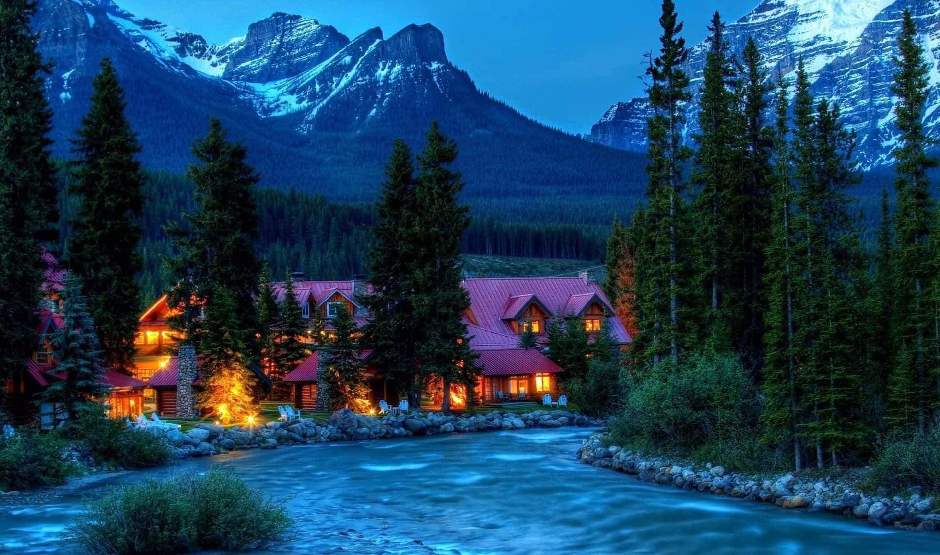 Cozy Winter Cabin, snow-covered forest, rushing river, Full HD Desktop Wallpaper
