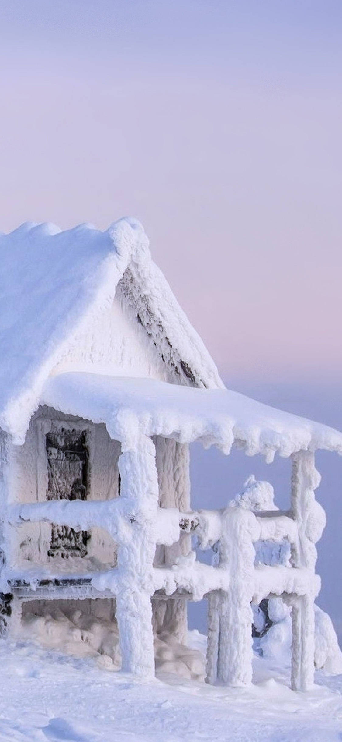 snow-covered wooden cabin, icicles hanging from its roof, soft pink and blue twilight sky, Full HD Phone Wallpaper